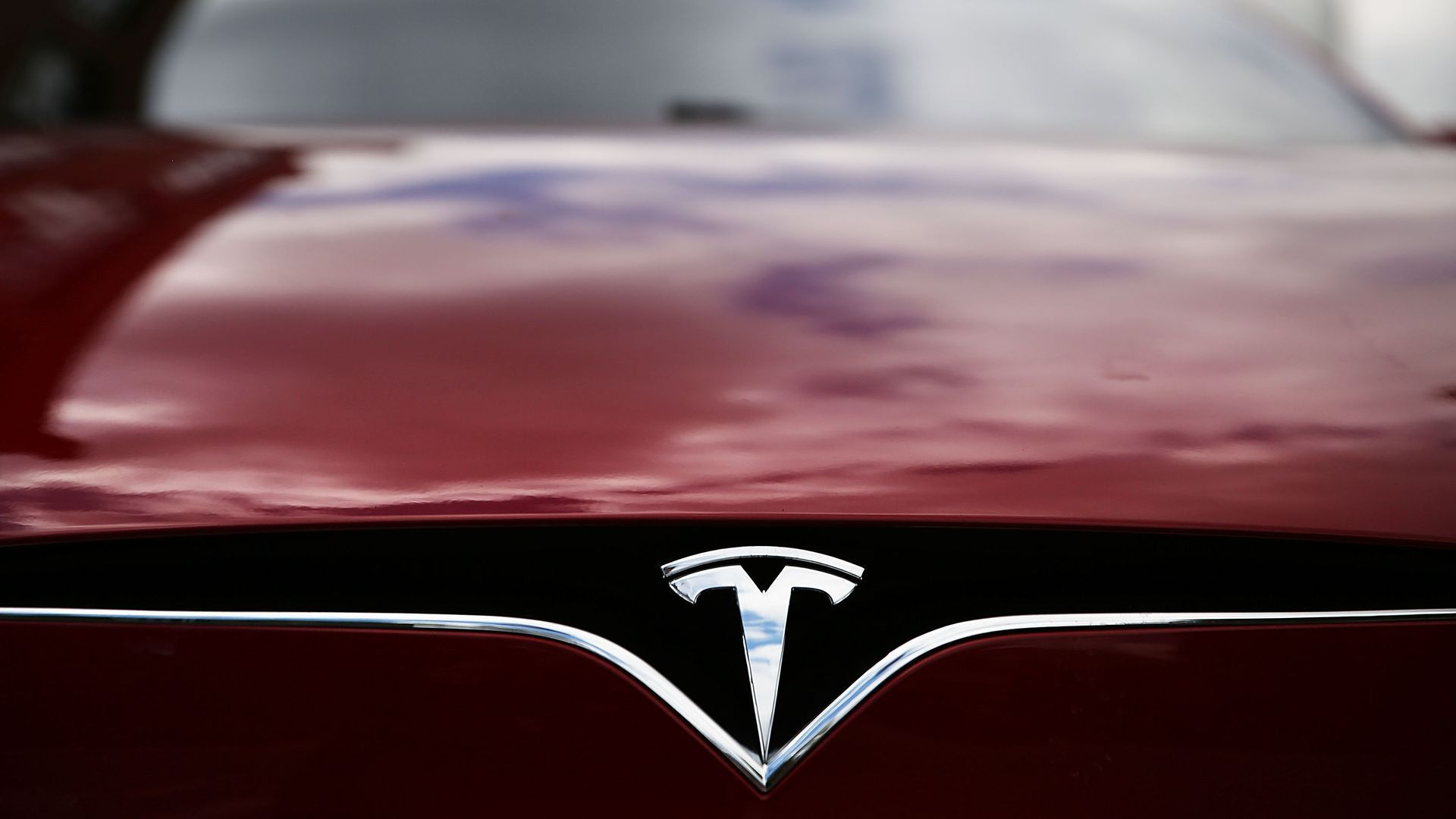 The Tesla logo.