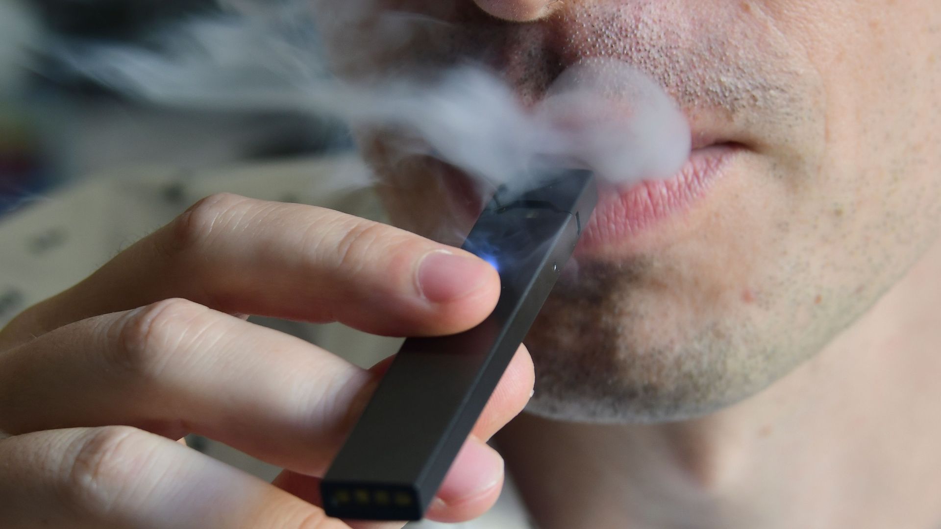 Man smoking juul.