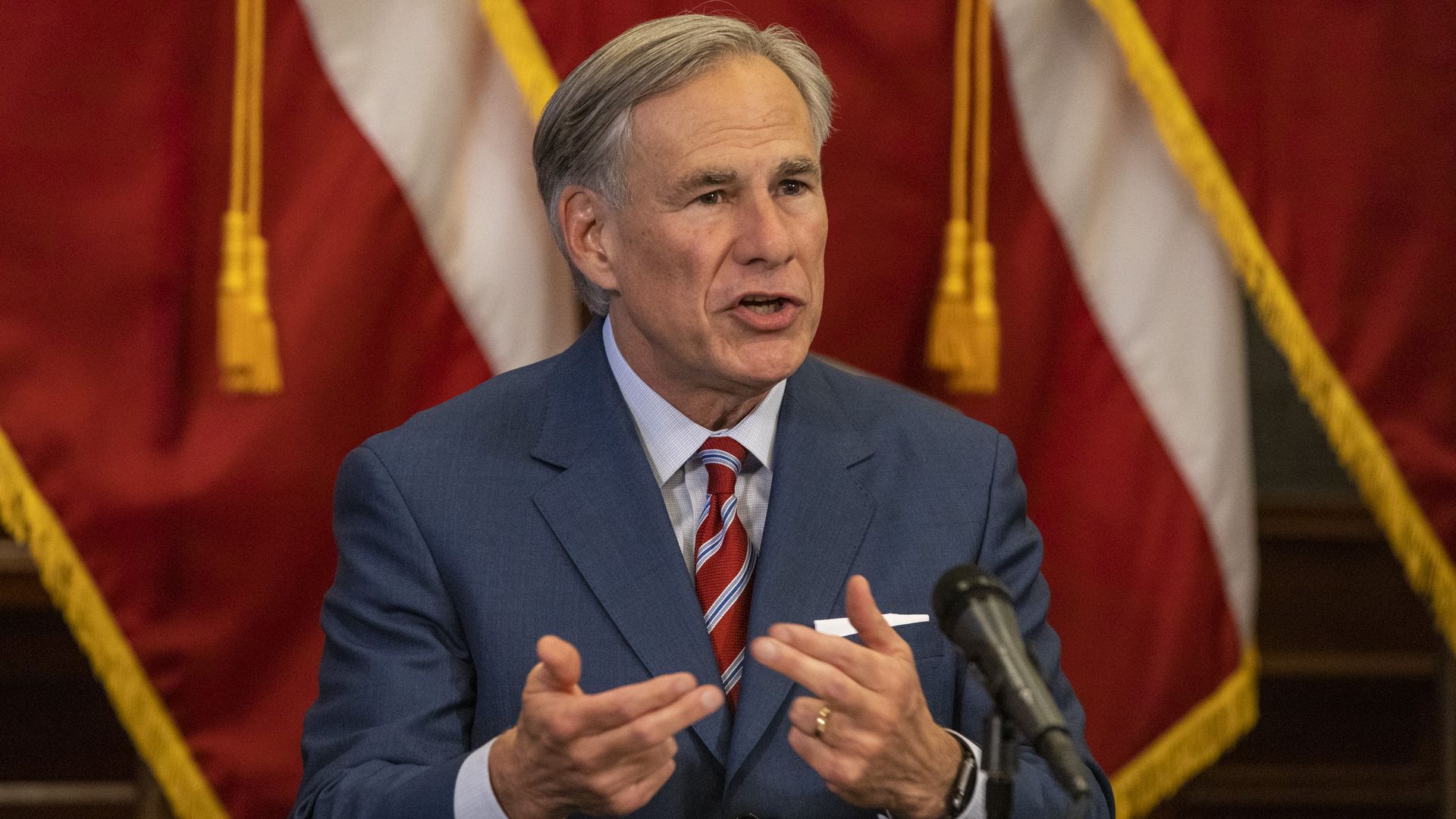 Texas Governor Greg Abbott announces the reopening of more Texas businesses during the COVID-19 pandemic at a press conference at the Texas State Capitol on May 18