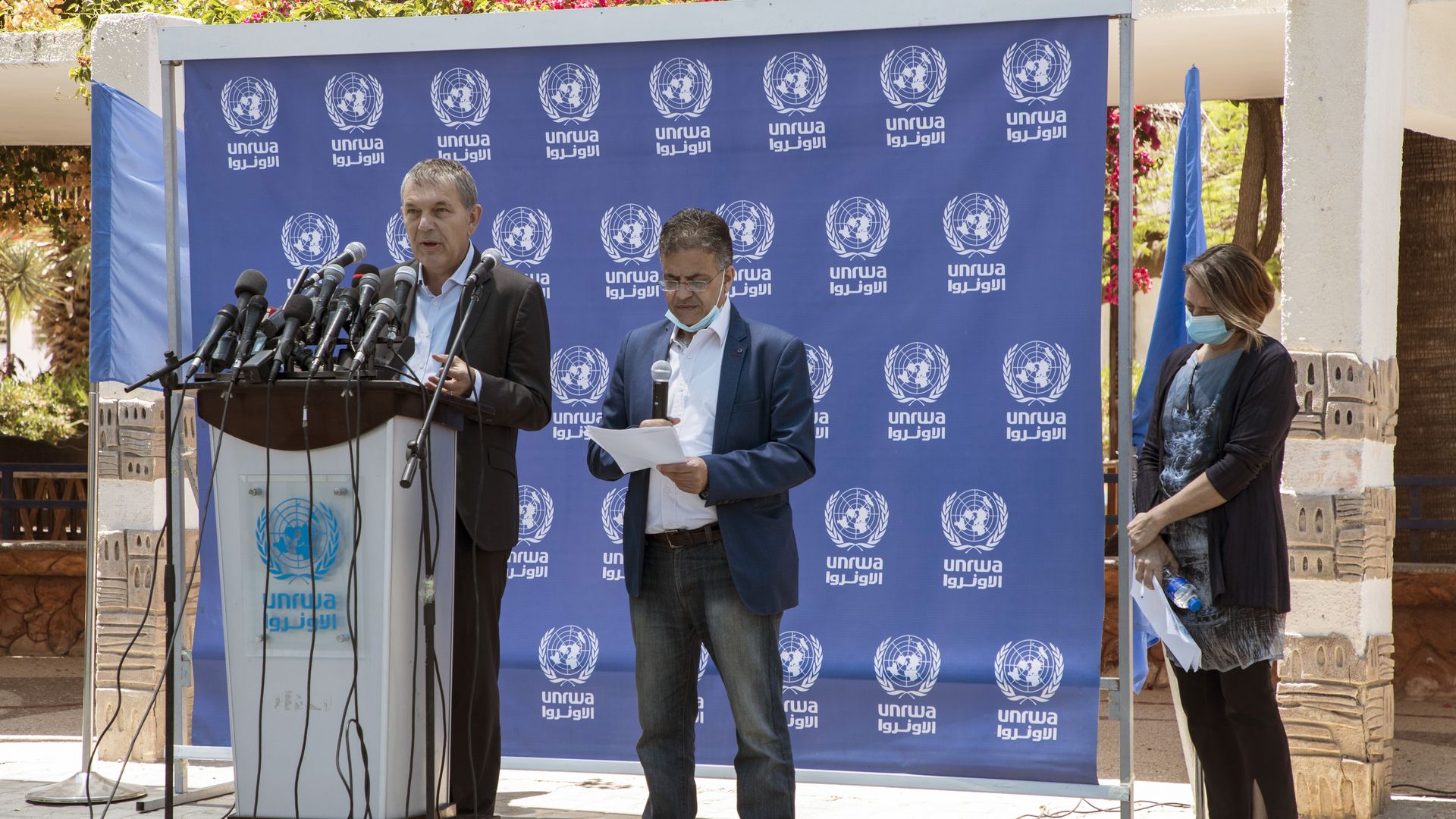 Philippe Lazzarini, (L) director of the UN agency for Palestinian Refugees (UNRWA) speaks with Lynn Hastings, ( far R) the UN humanitarian coordinator for the occupied Palestinian territories on May 23,2021 in Gaza City