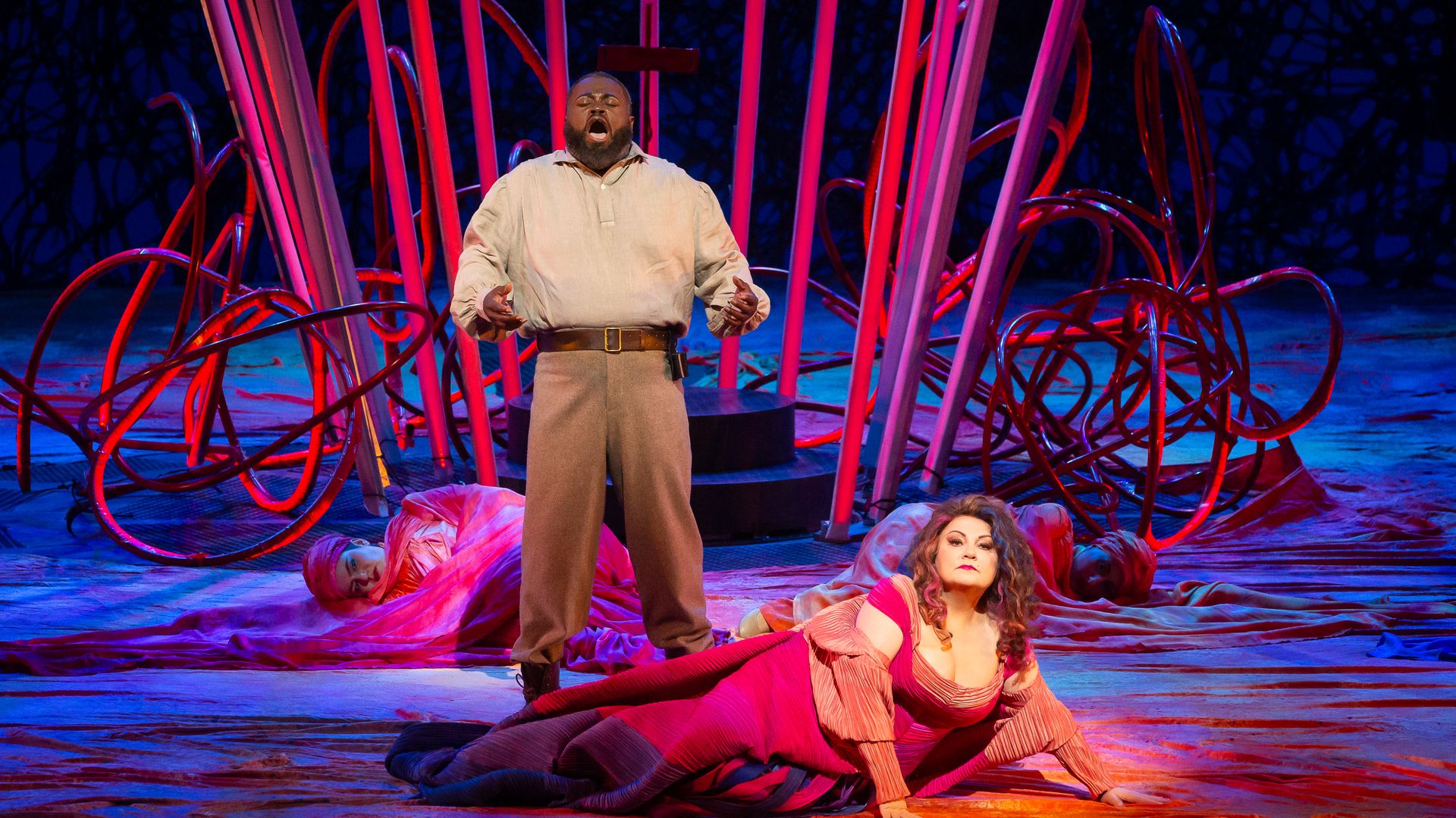 Photo of two people on the stage. 