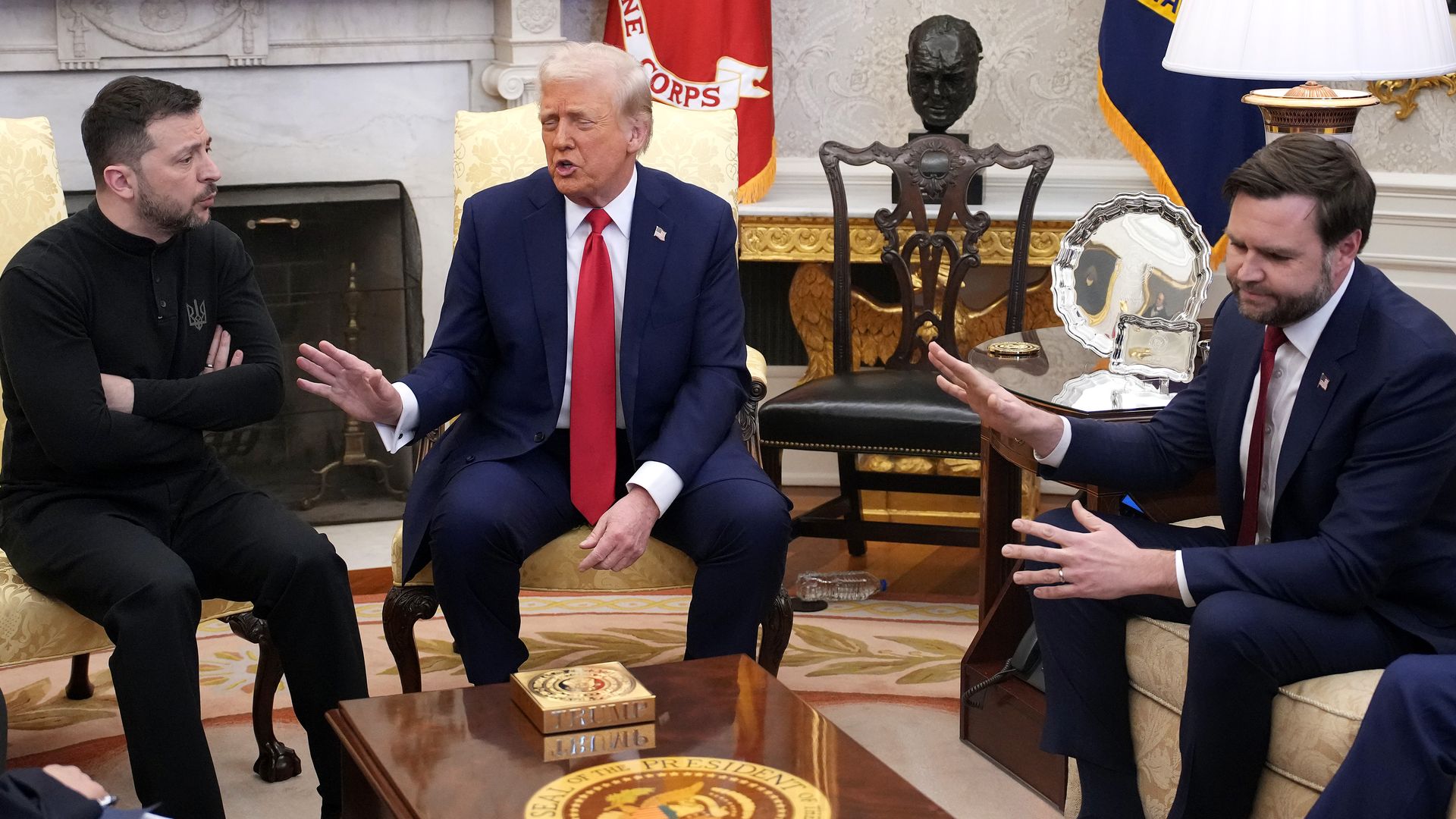 Ukrainian President Volodymyr Zelensky sits with his arms folded while President Trump and Vice President JD Vance gesture during their heated meeting in the Oval Office at the White House on February 28.