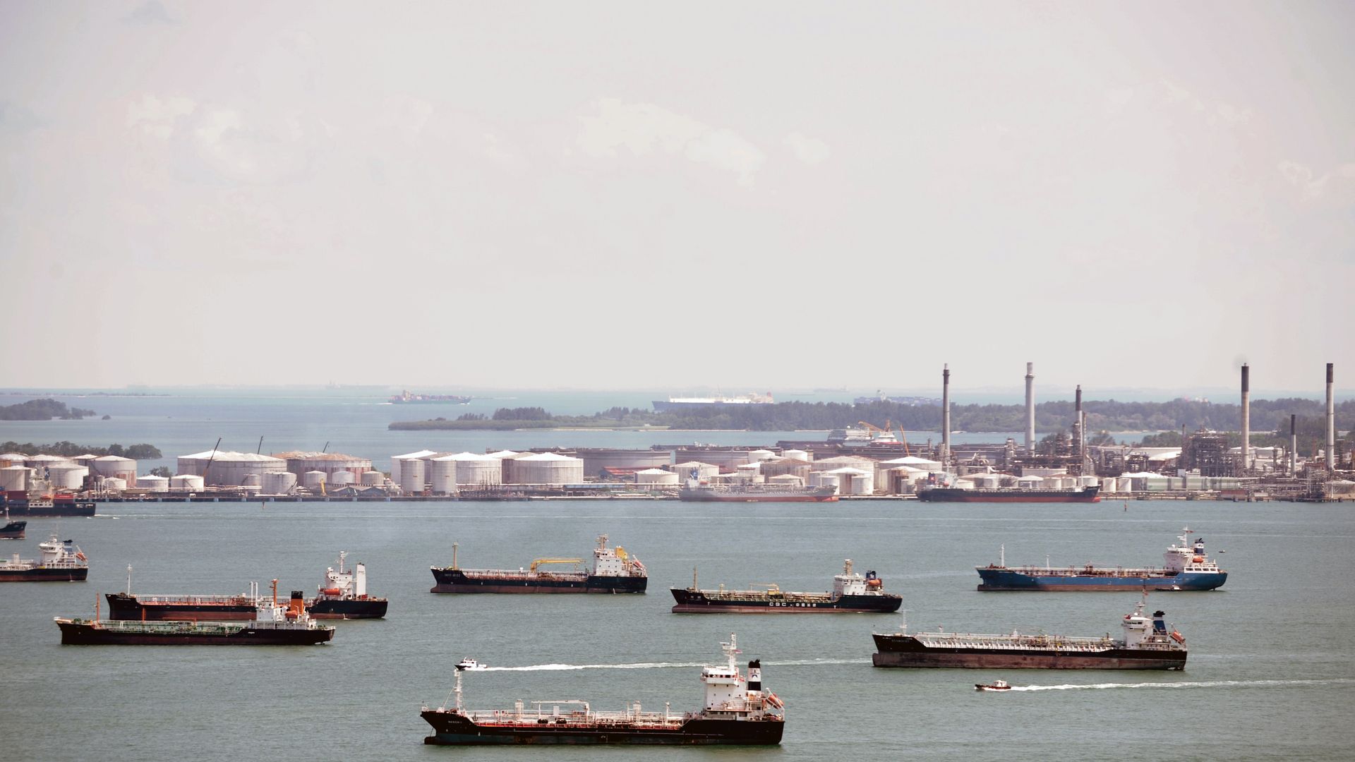 shipping vessels near port and oil refinery facilities