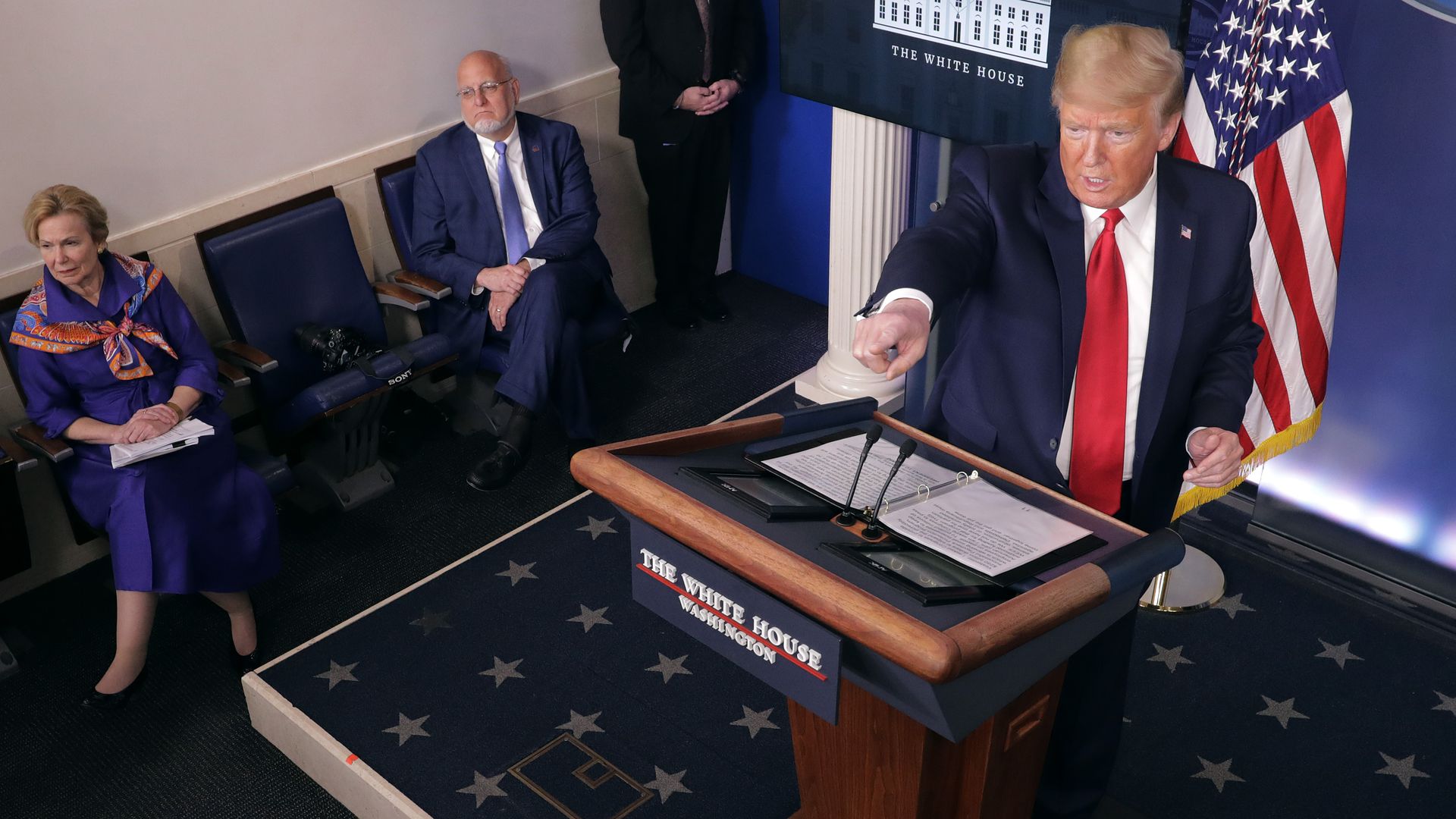 Trump calls on reporters during a news conference with Centers for Disease Control and Prevention Director Robert Redfield at the daily coronavirus task force briefing