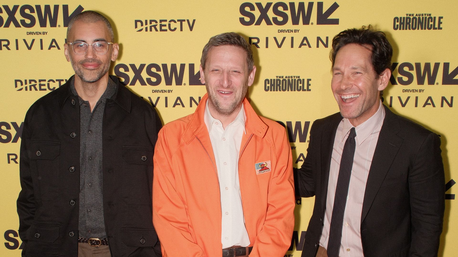 Three people posing at South By Southwest.