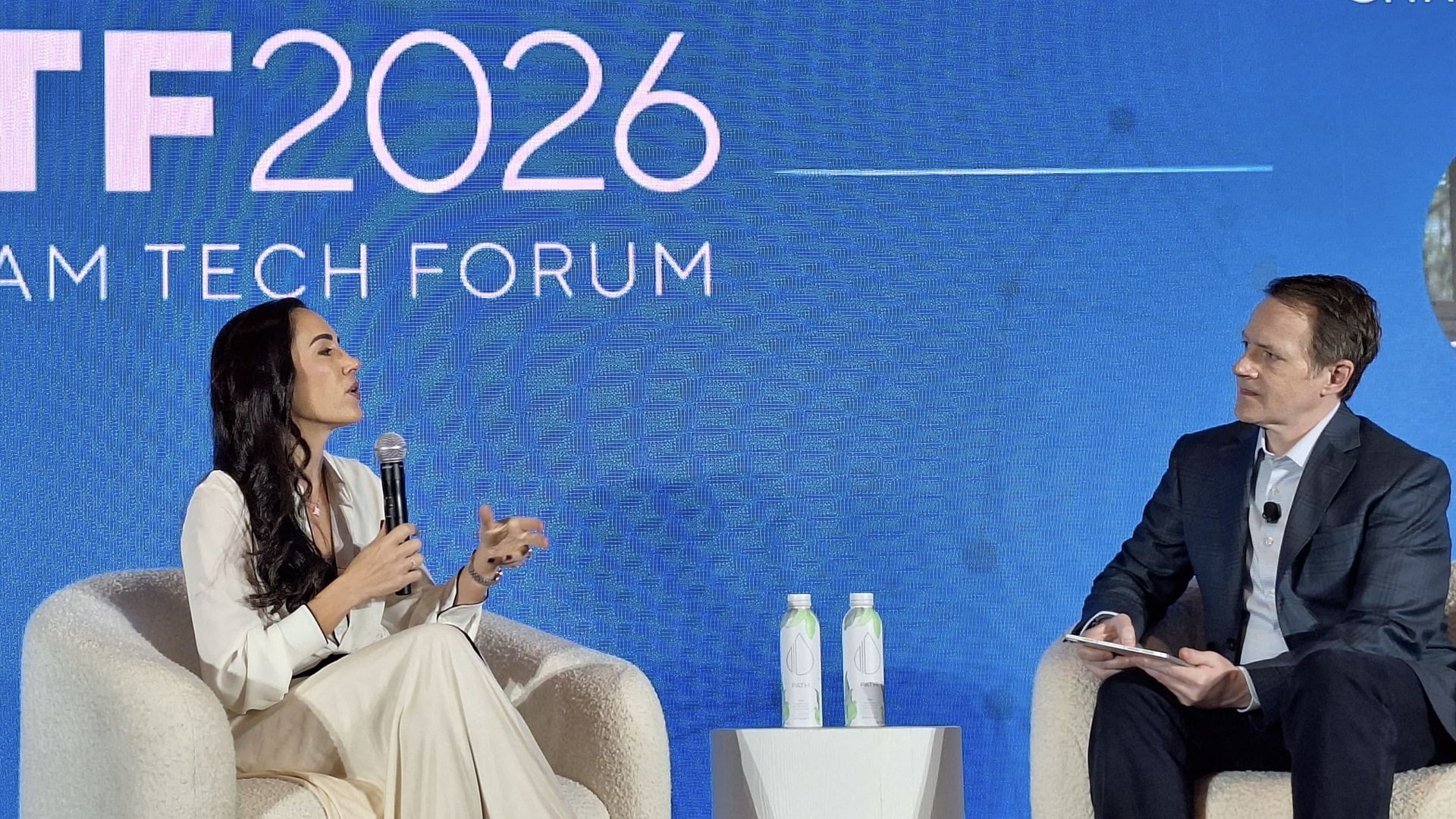 Nu co-founder Cristina Junqueira on stage with Axios' Ryan Lawler at Riverwood Capital's LatAm tech forum in Miami on April 24. 