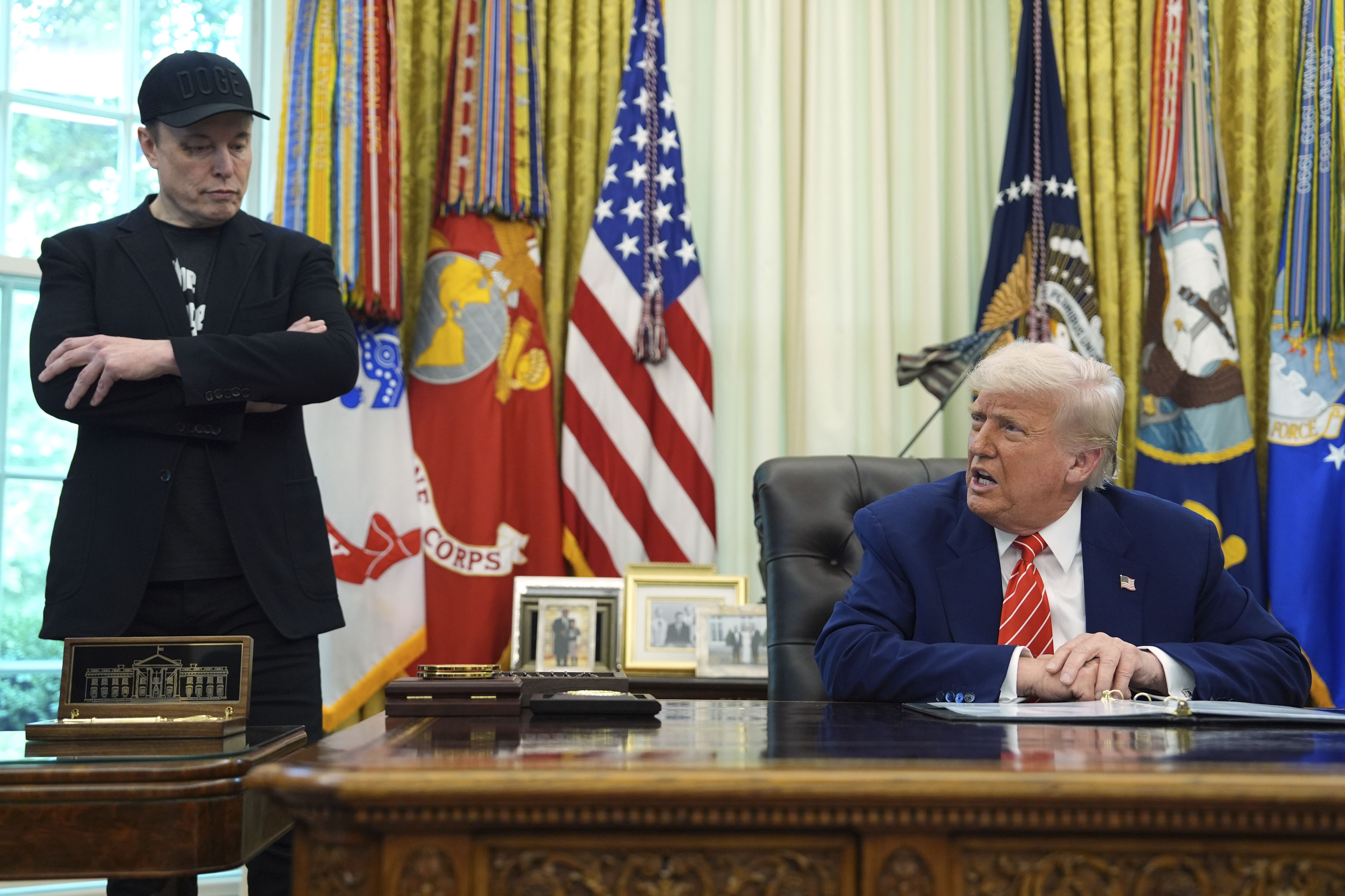 President Trump and Elon Musk speak during an Oval Office press conference last week.