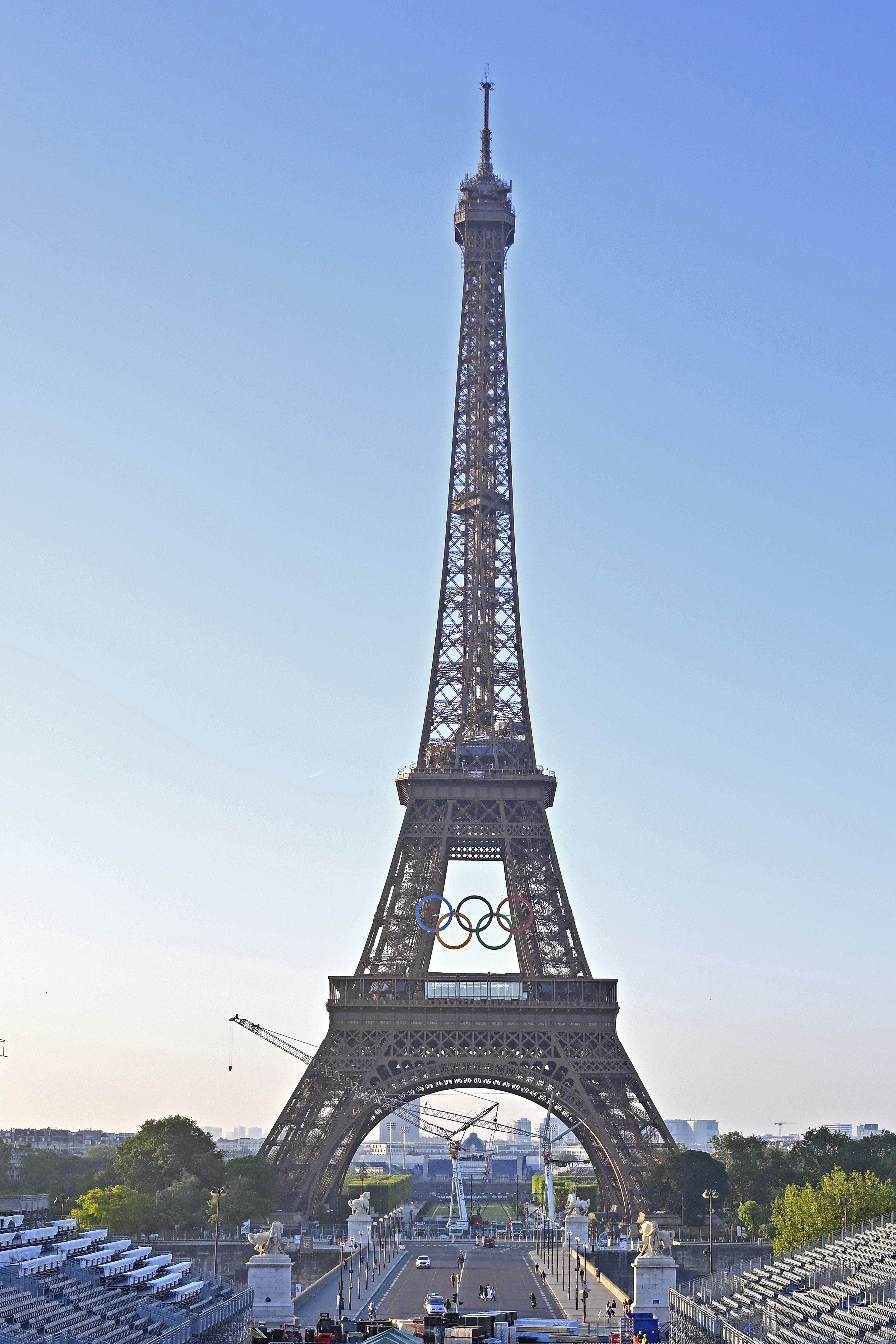 A 30-ton version of the Olympic Rings is unveiled today on the Eiffel Tower, 50 days ahead of Opening Ceremony along the River Seine on July 26.