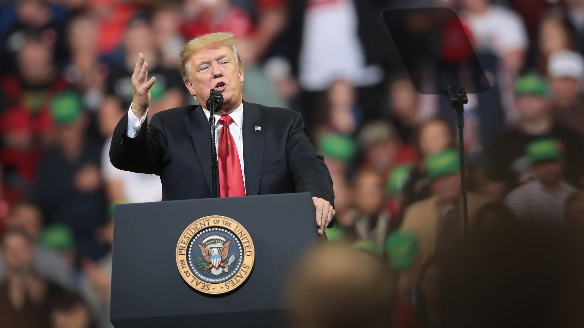 Donald trump speaking at a trump rally