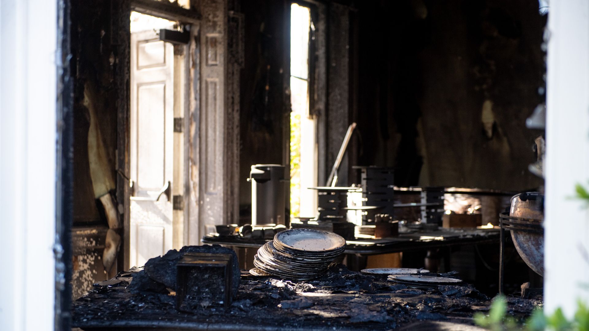 Extensive fire damage to the Pennsylvania Governor's Mansion and Gov. Josh Shapiro's residence is seen during a press conference on April 13, 2025 in Harrisburg, Pennsylvania.
