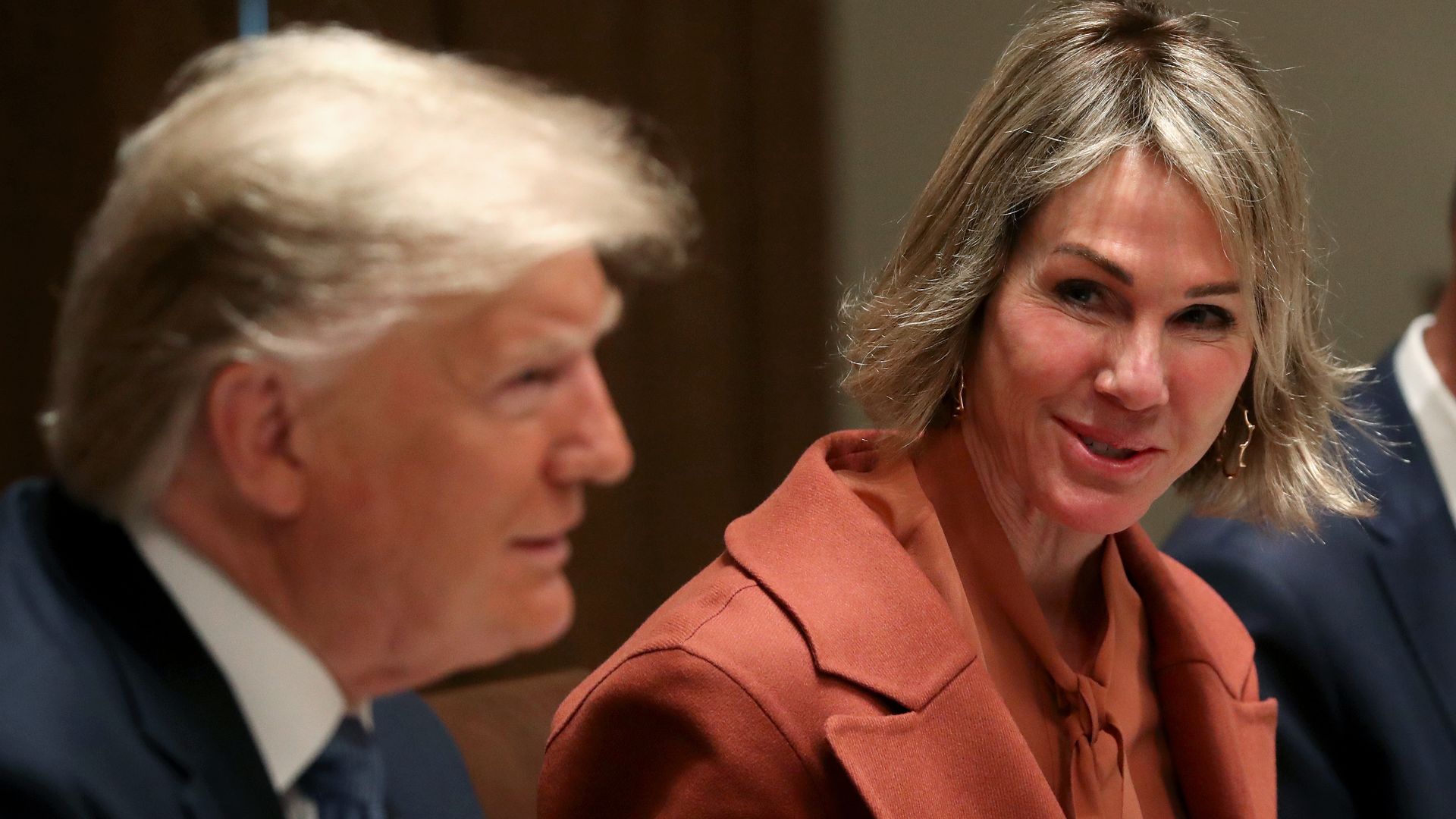 President Donald Trump (L) and Ambassador Kelly Craft, speak to the media during a luncheon with representatives of the United Nations Security Council,