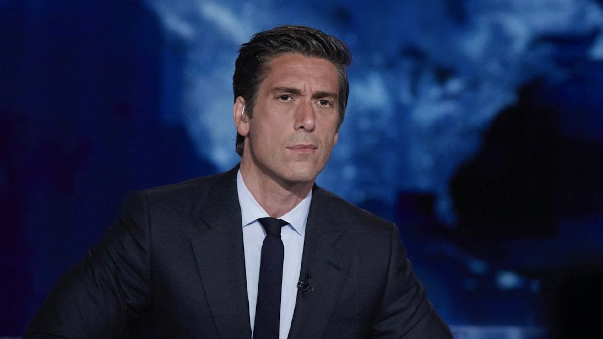 David Muir sits at the anchor desk