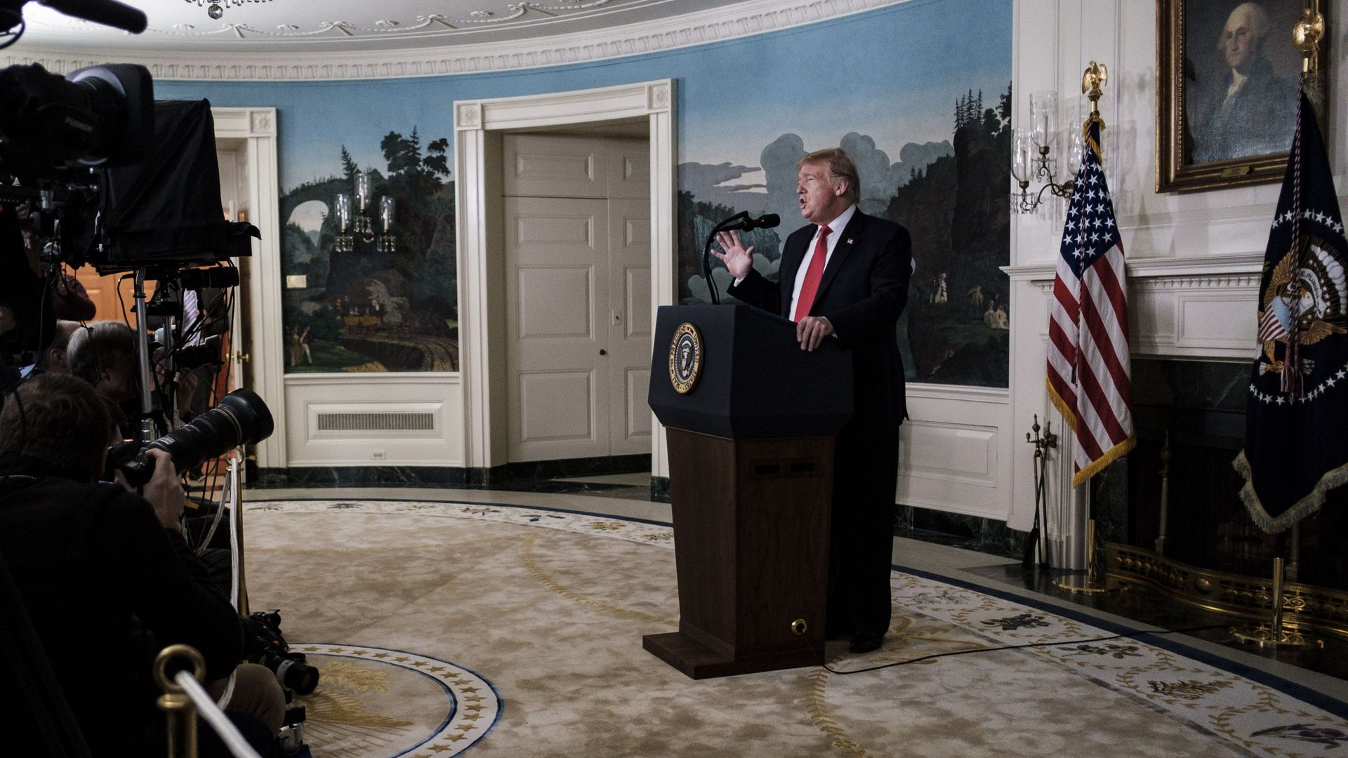 Trump at a podium in the white house
