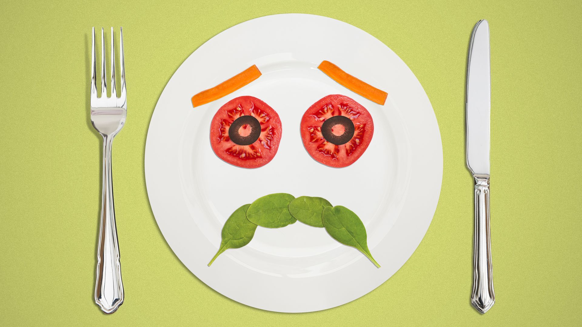 Illustration of salad ingredients forming a frowny face on a plate.