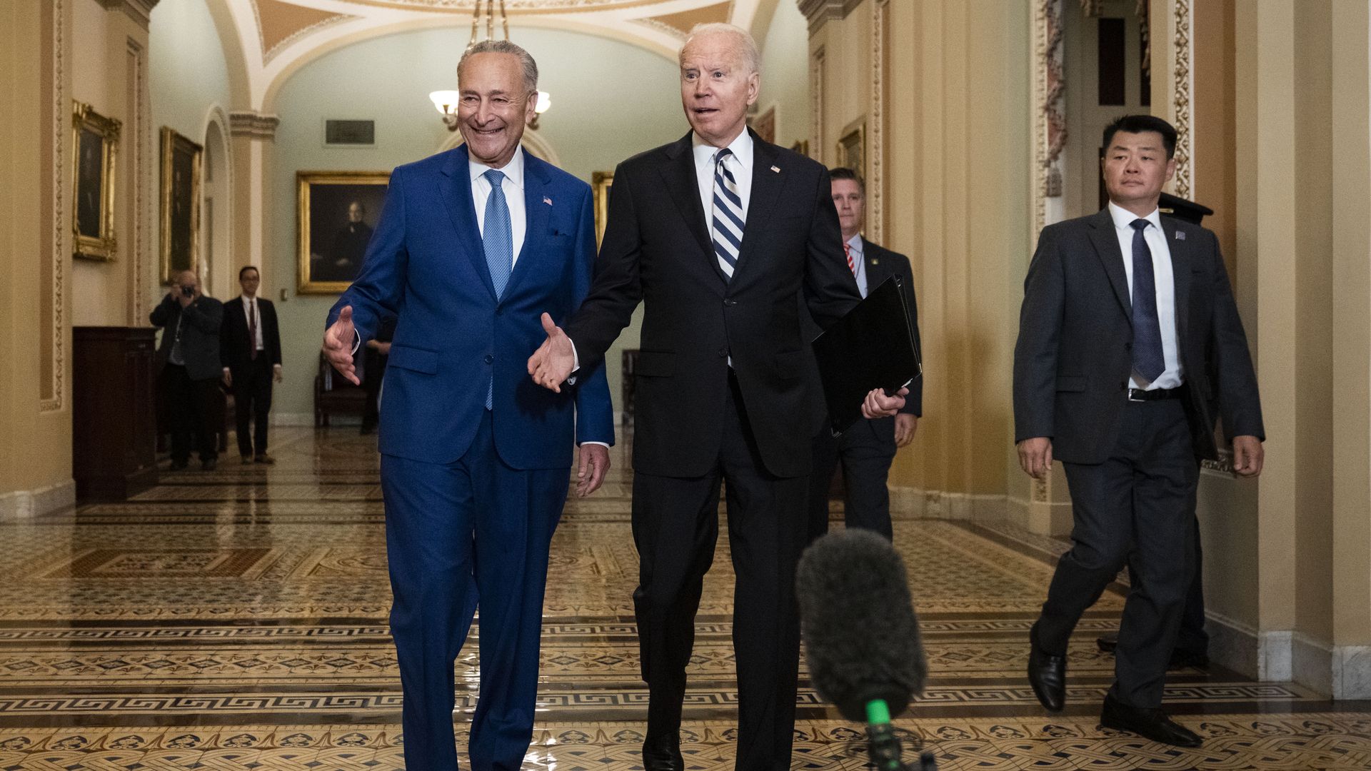 President Joe Biden and Senator Chuck Schumer seen in the Senate.