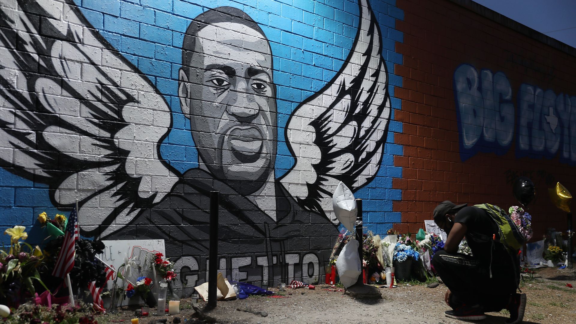 A mural that honors George Floyd at the Scott Food Mart corner store in Houston's Third Ward where Floyd grew up on June 8, 2020 in Houston, Texas.