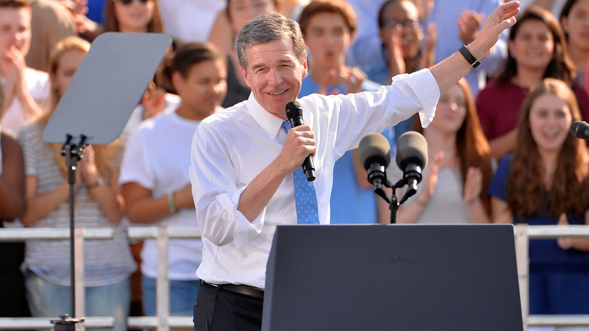 North Carolina Gov. Roy Cooper speaking at a podium