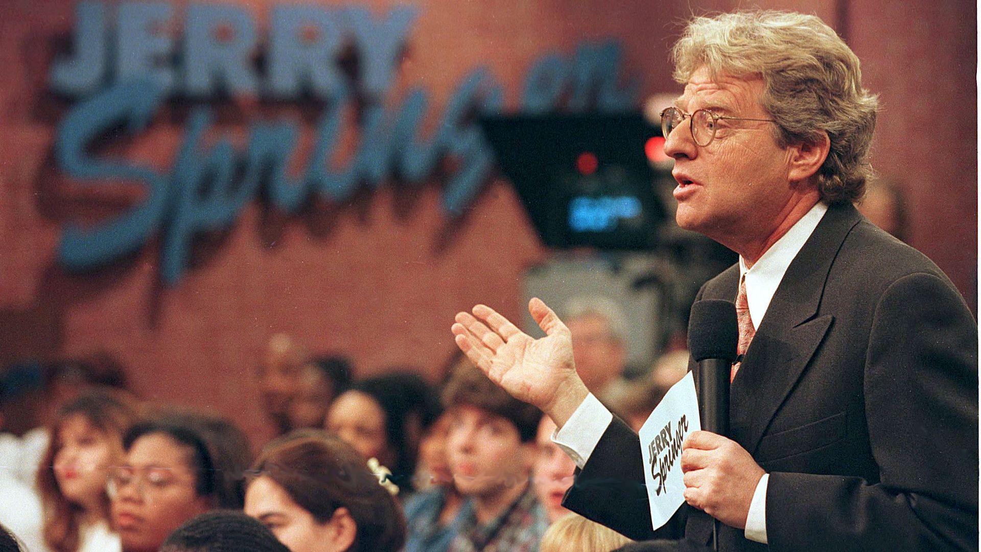 Talk show host with a mic