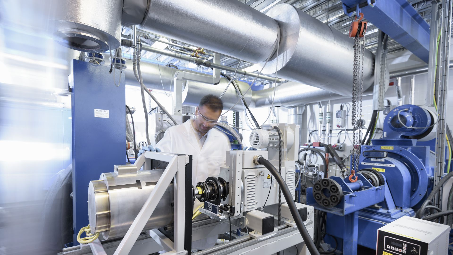 Scientists testing a lithium car battery