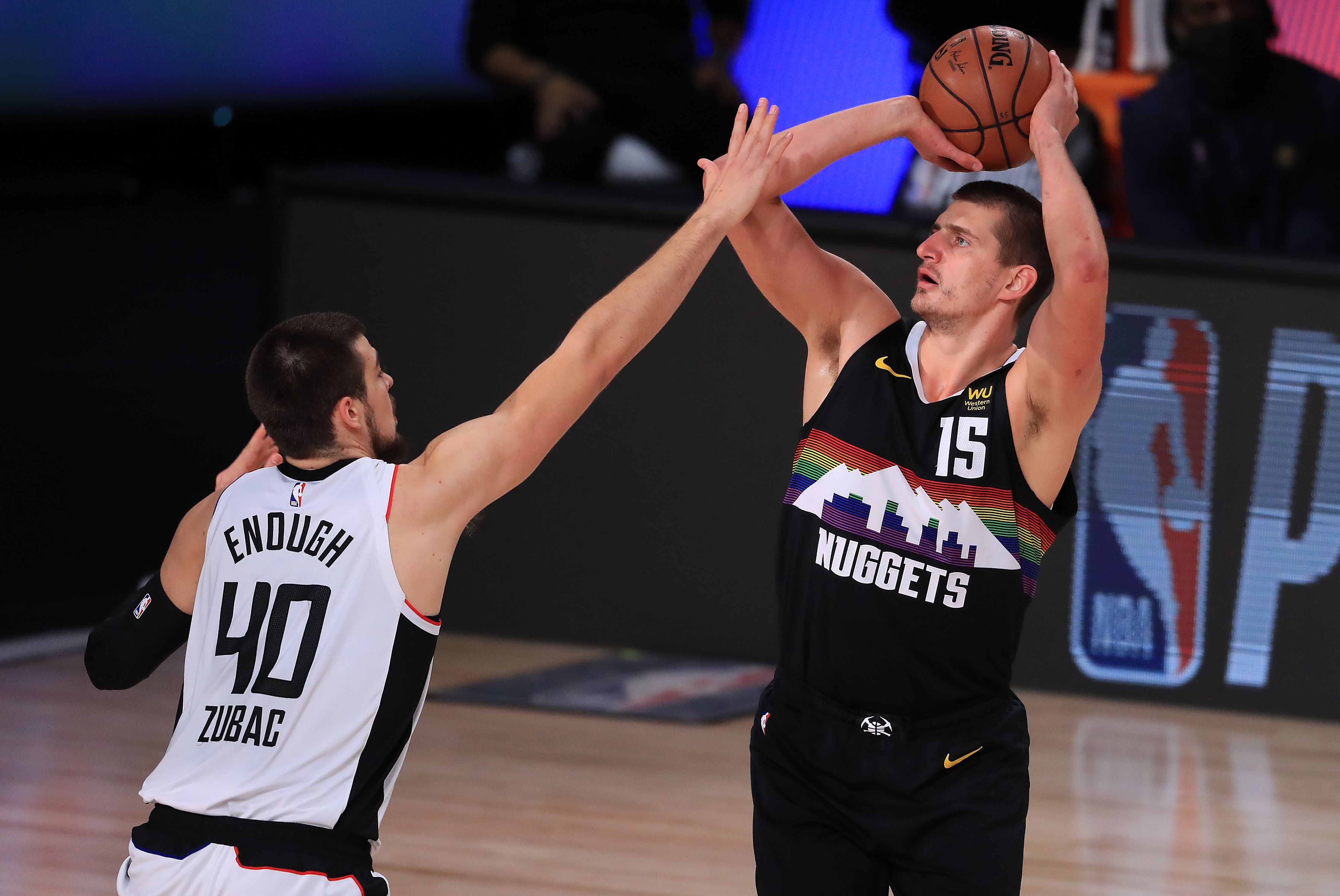 Nikola Jokic shoots over Ivica Zubac