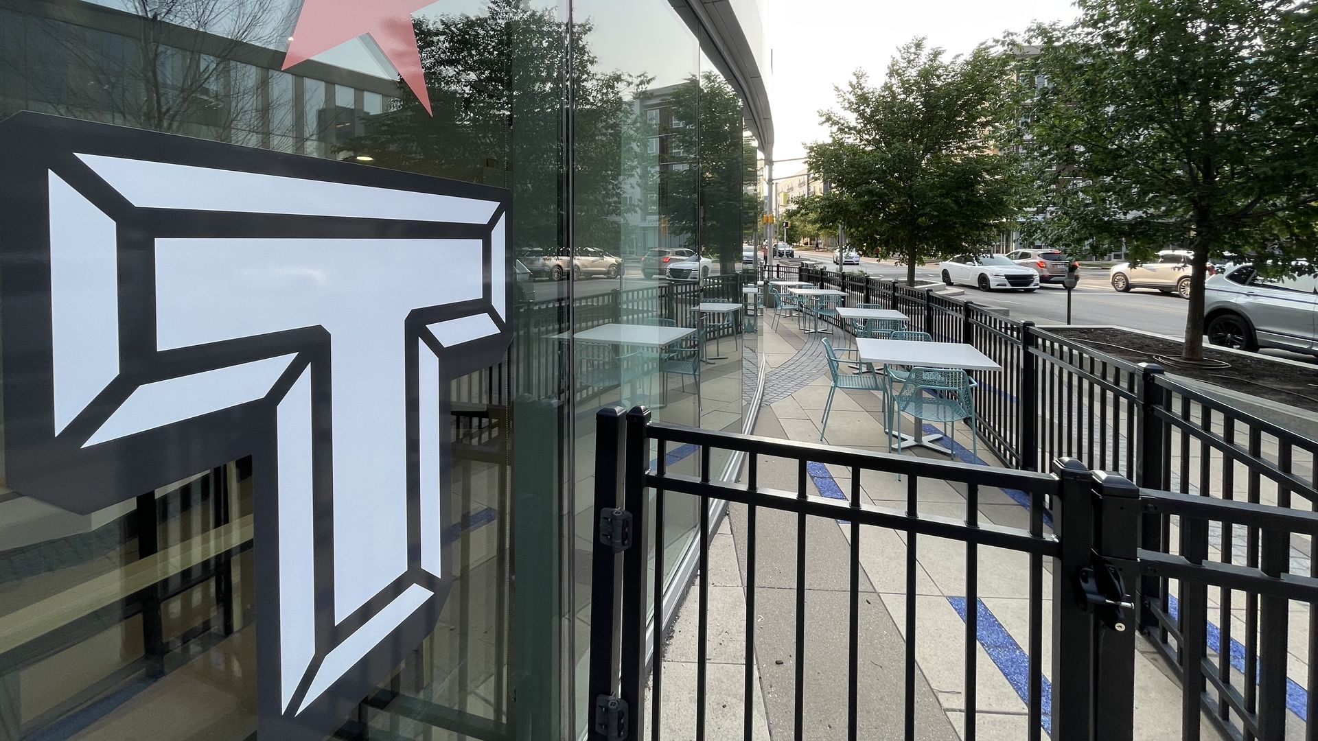The Tinker Coffee logo on a window outside the new cafe in the 360 Market Square tower.
