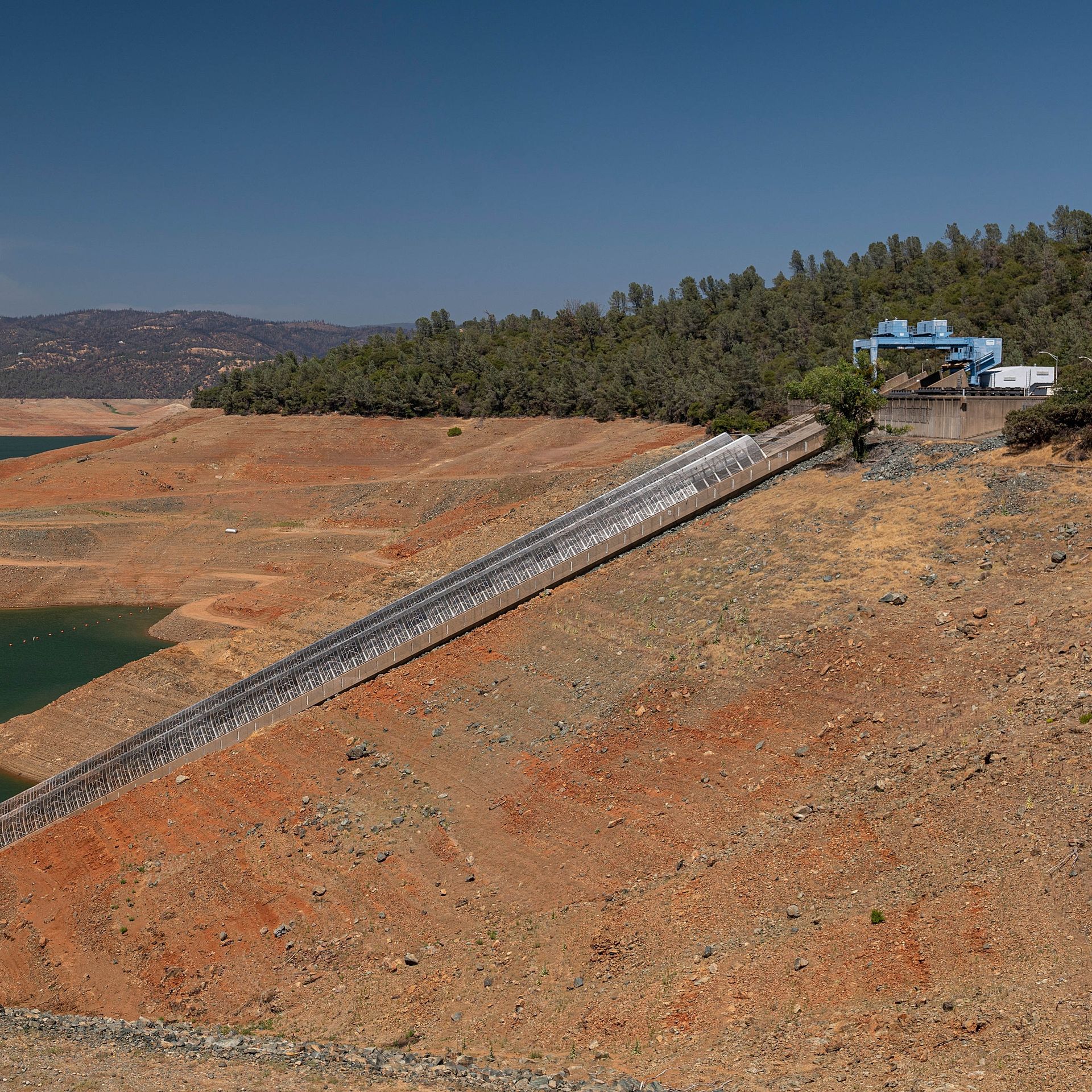 Penstock intakes for the Hyatt Powerplant at Lake Oroville during a drought in Oroville, California, U.S., on Thursday, July 15, 2021.