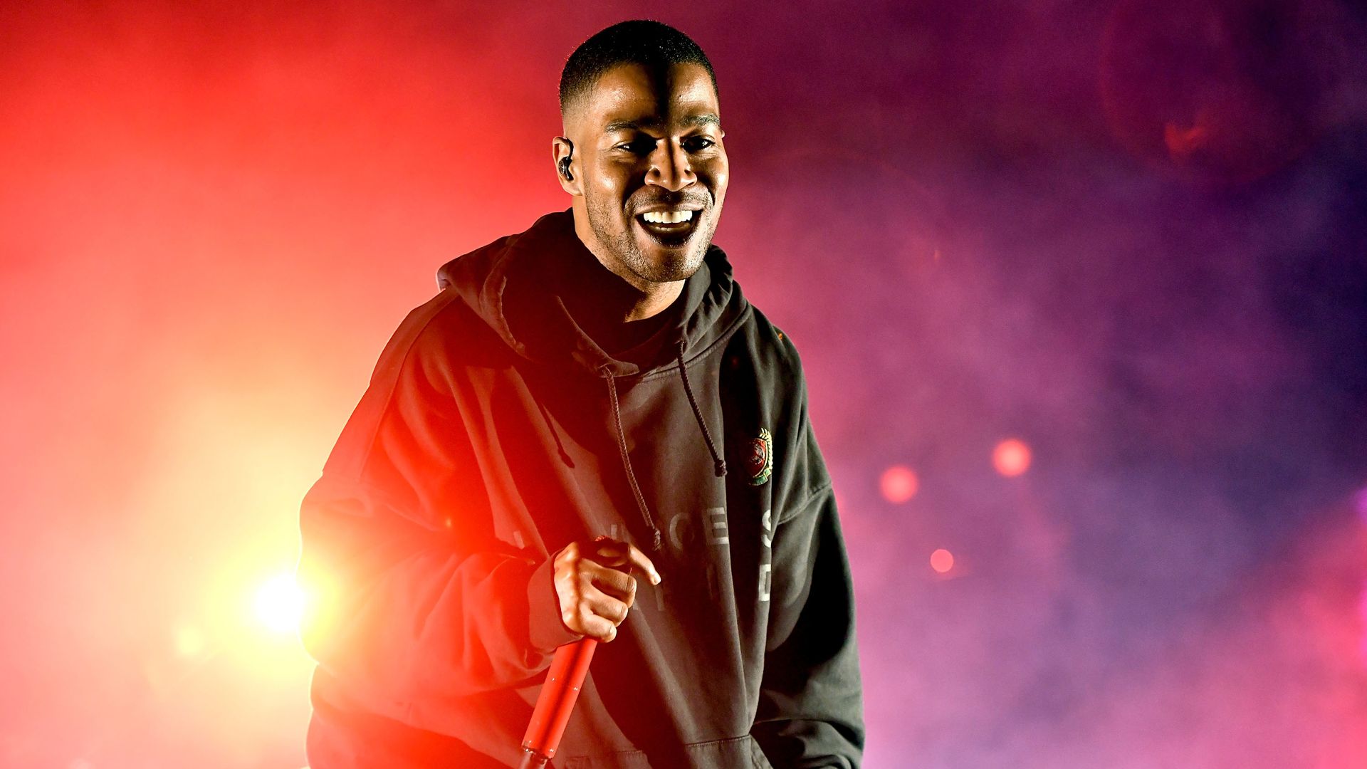 Rapper Kid Cudi performs on stage. 