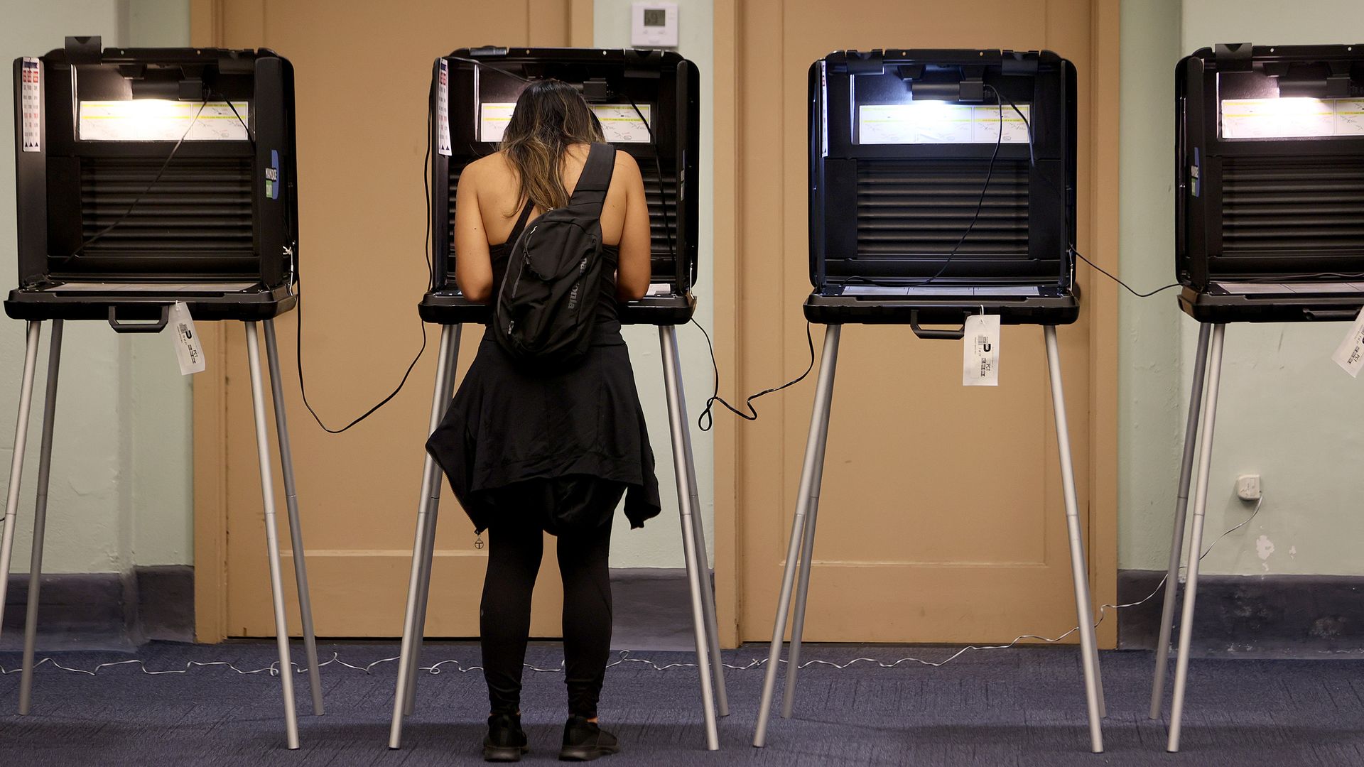 A voter fills out an election ballot at a polling station in Miami, Florida, in 2021.