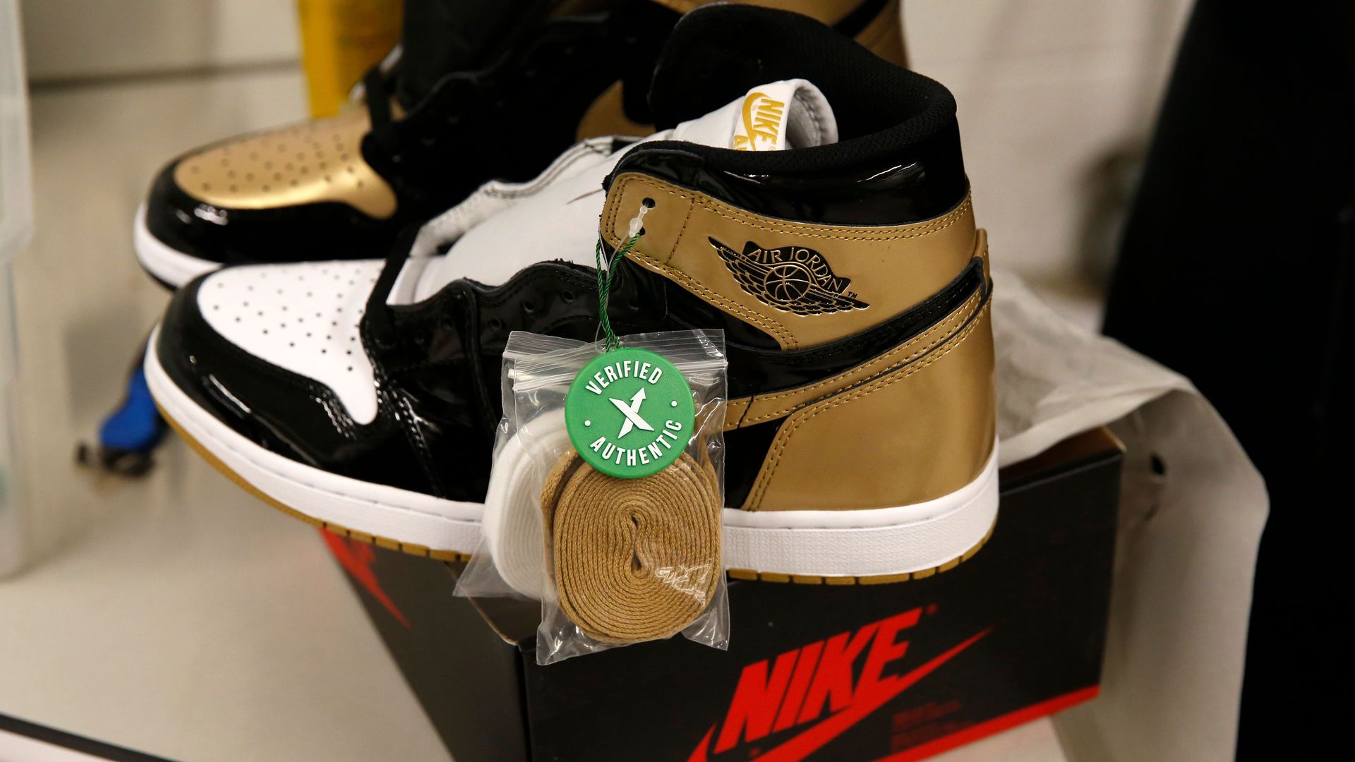 A pair of Air Jordan 1 Retro shoes are seen before being packed to ship out of Stock X