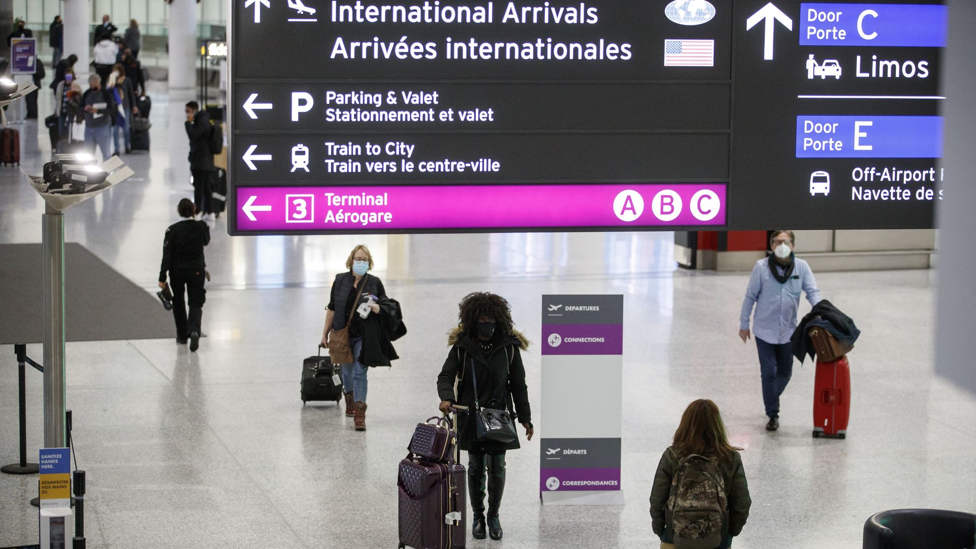 Travelers at Toronto Pearson International Airport (YYZ) in Toronto, Ontario, Canada, on Thursday, Dec. 16, 2021. 