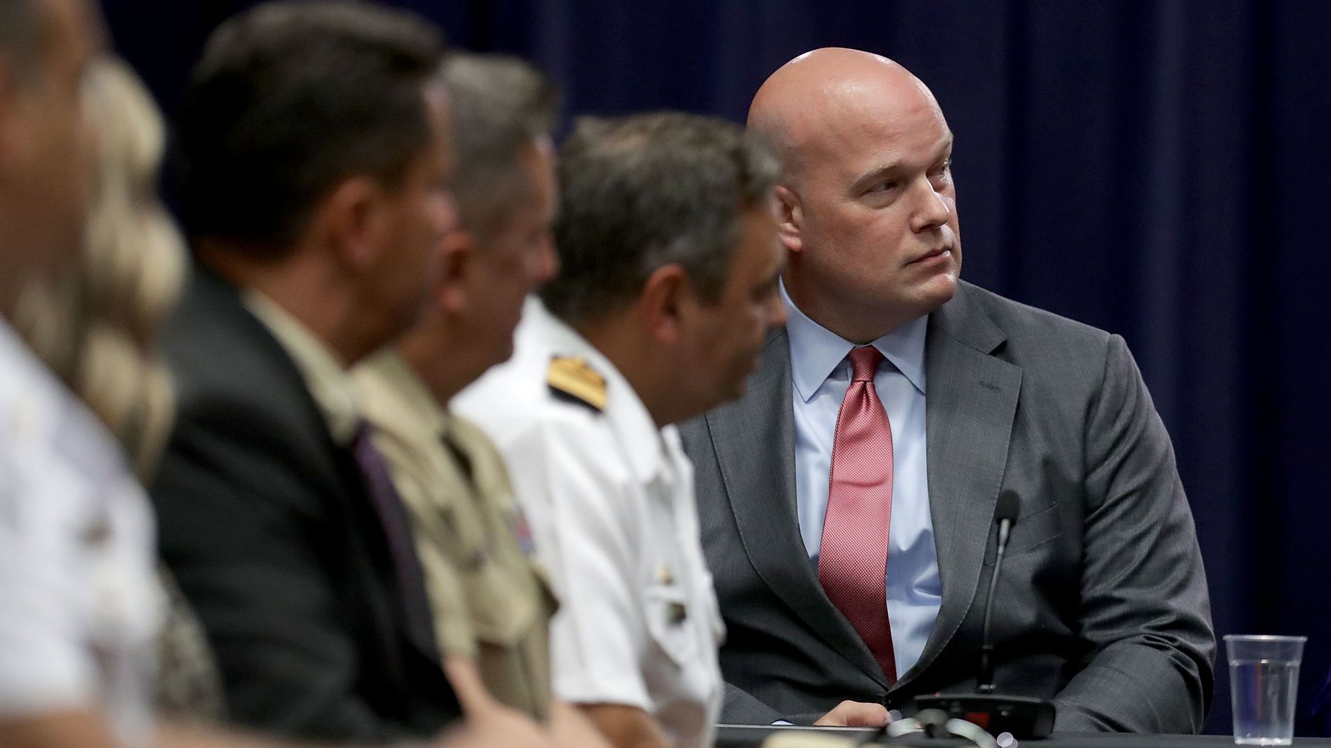 Matt Whitaker sits at a roundtable.