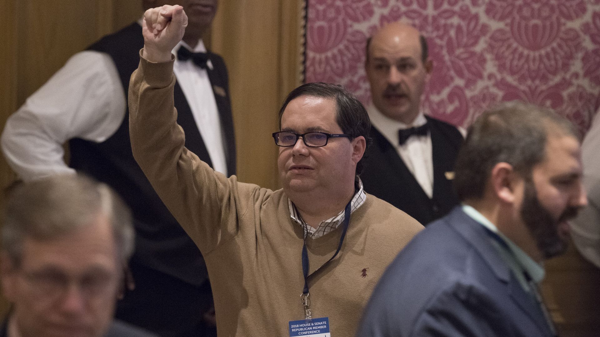 Blake Farenthold raising his hand in the air.