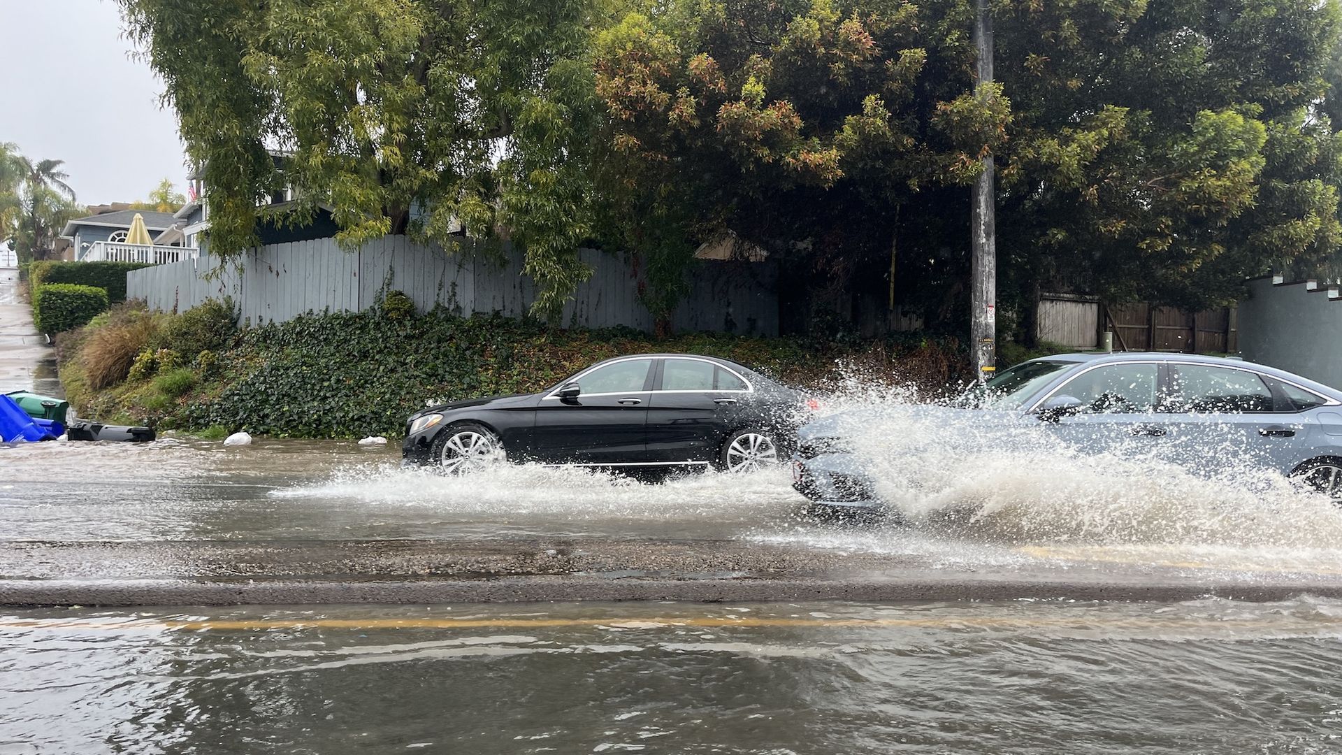 Cars in flooded streets in Point Loma.