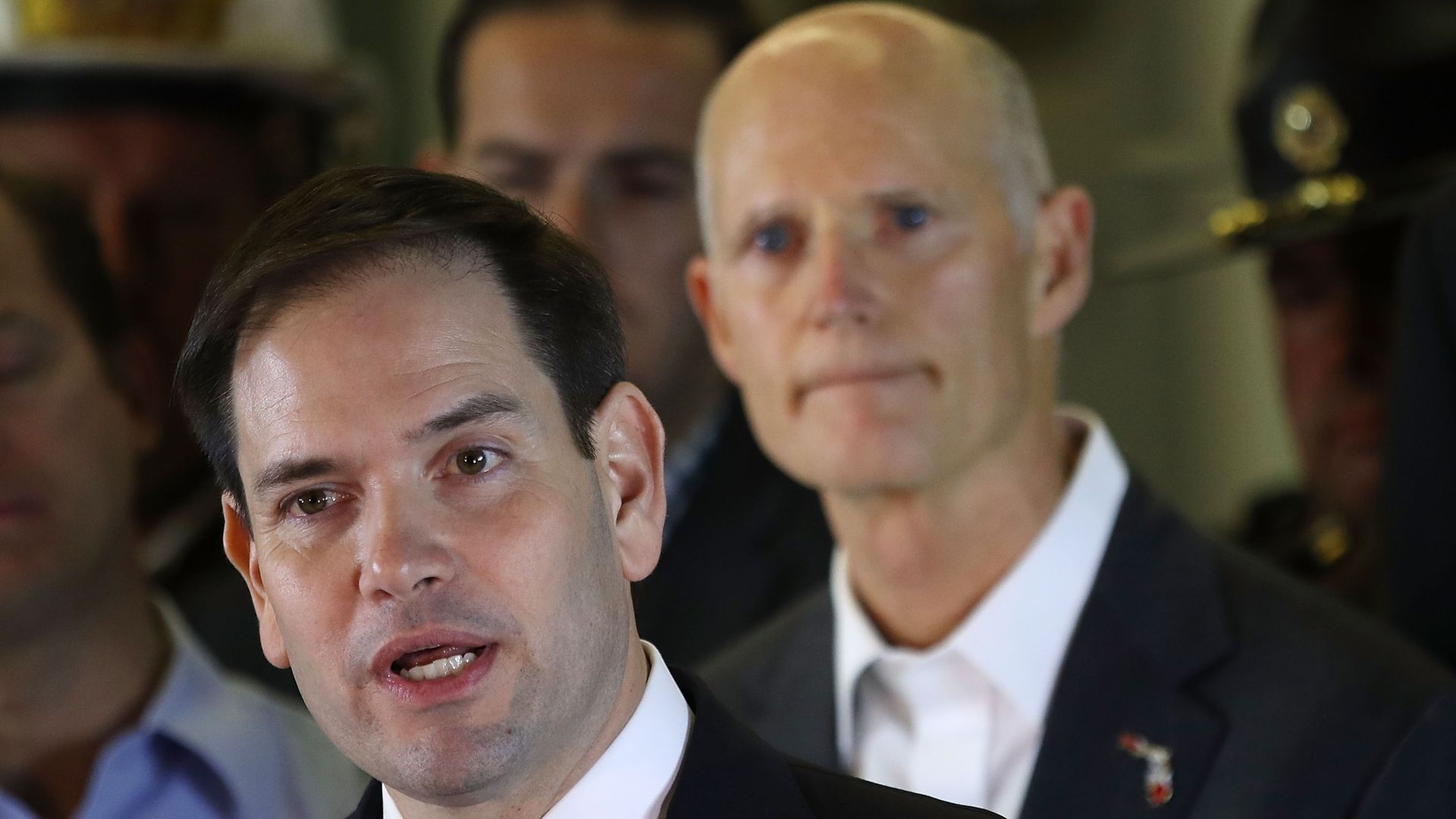 Sen. Marco Rubio (R-FL) speaks to the media with Rick Scott.
