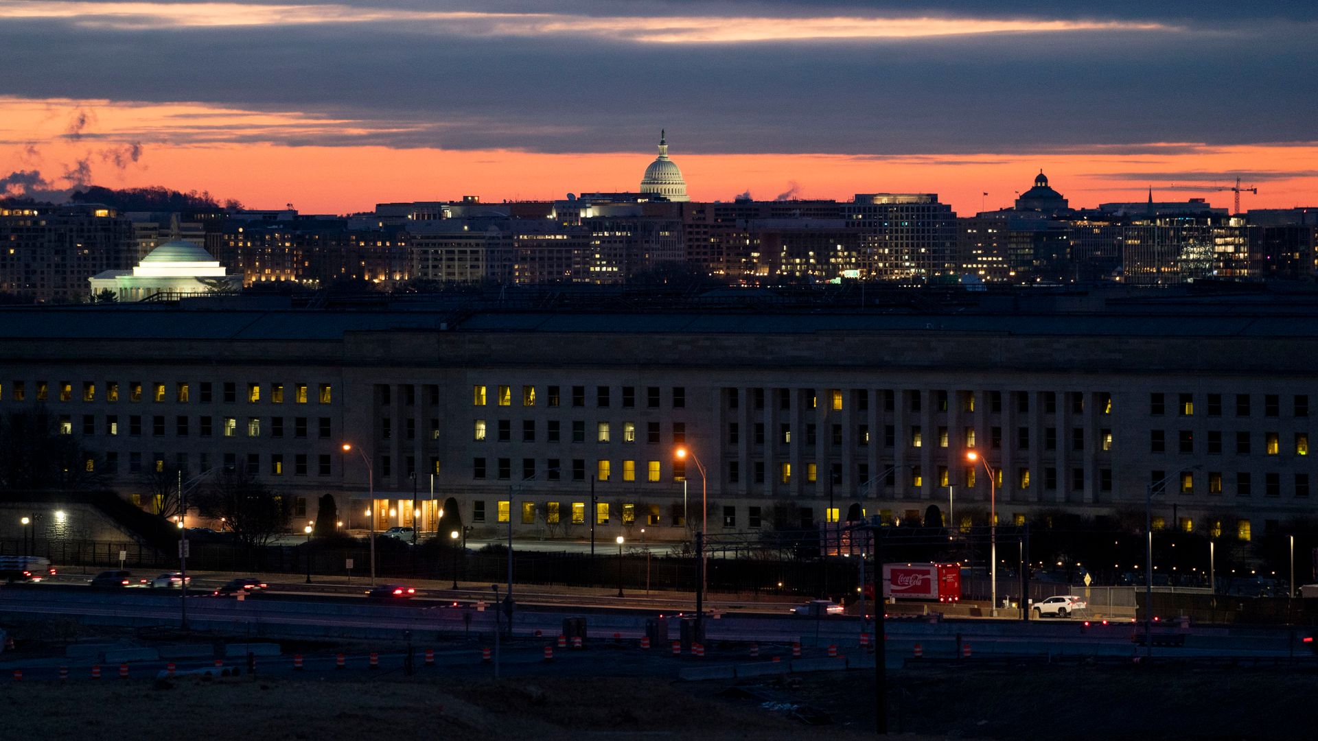 A landscape of Washington at sunset, including the Pentagon and the Capitol Dome. It looks cold.
