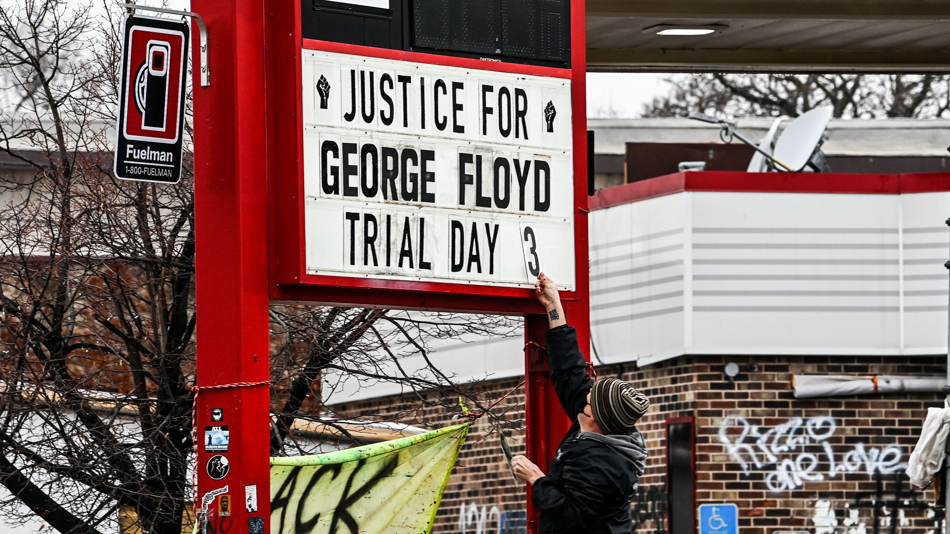 a sign saying justice for george floyd