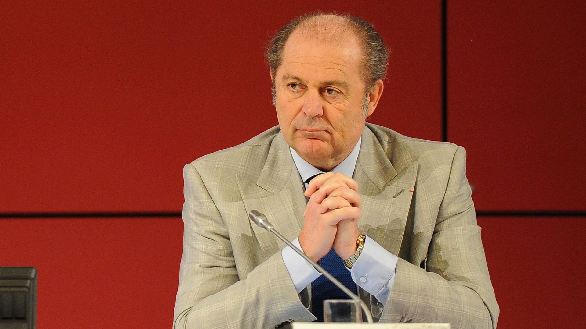 Philippe Donnet, CEO of Generali, seated at a corporate event