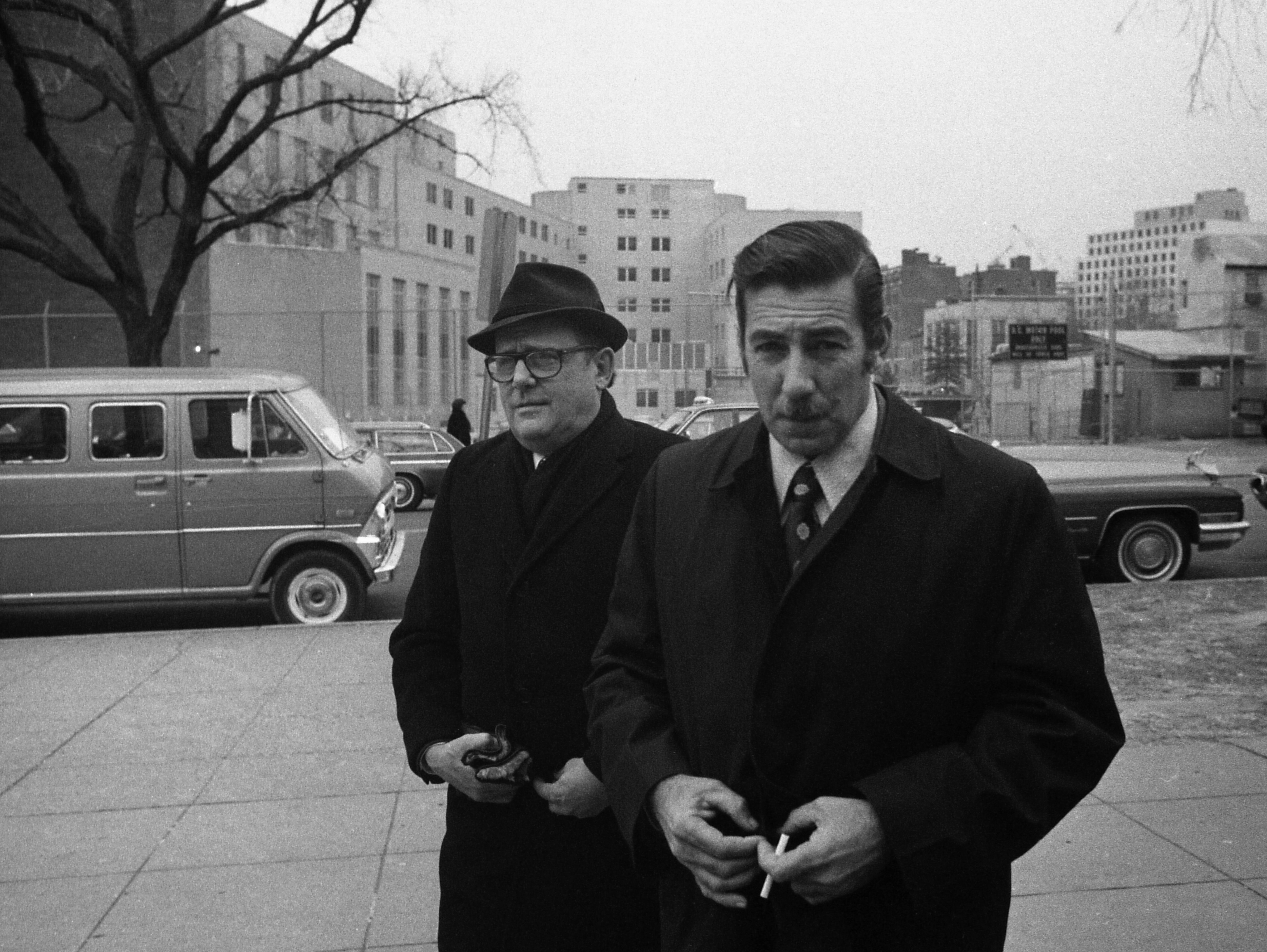 Bernard Barker and Virgilio Gonzales outside of a district court before their Watergate trial.