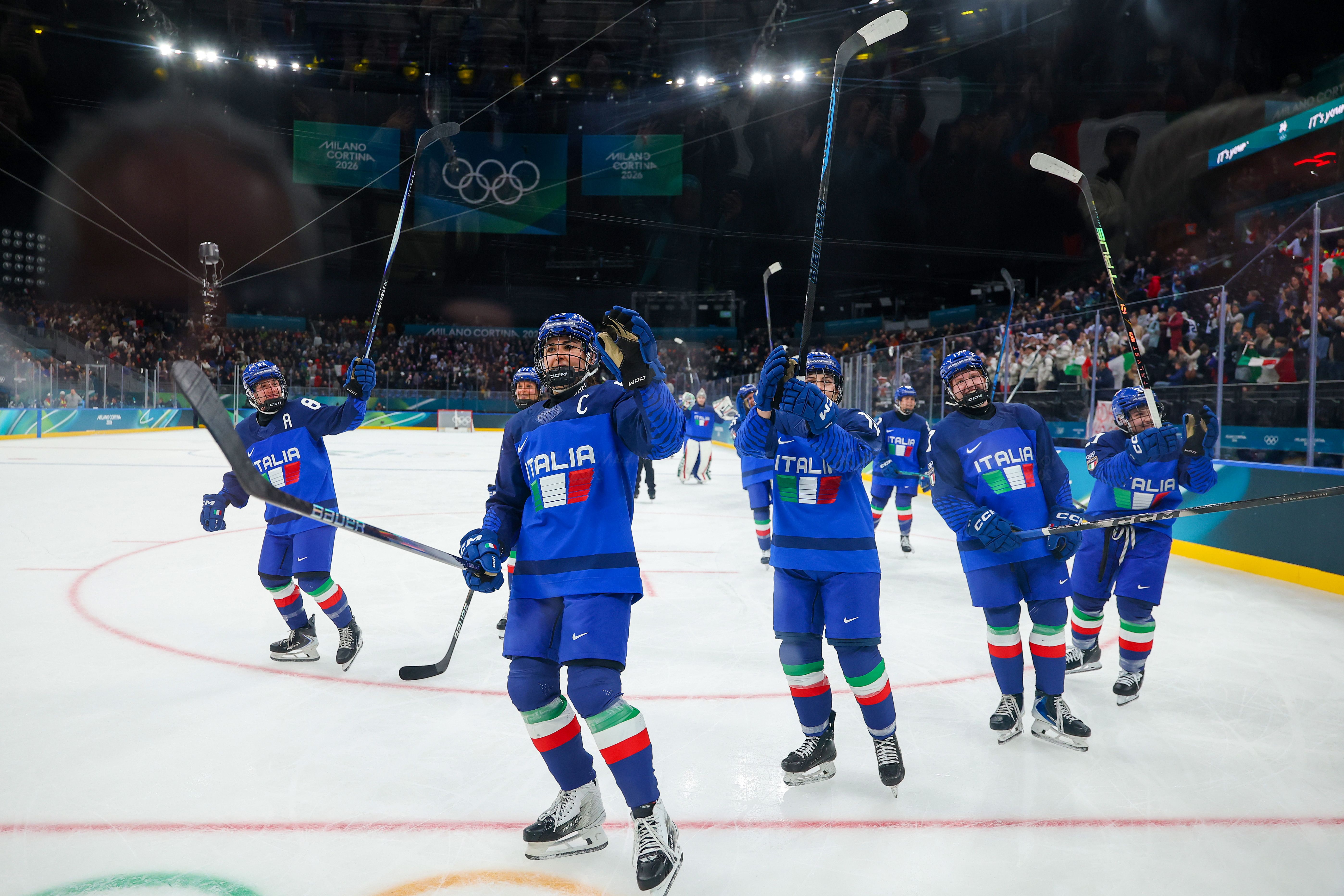 MILAN, ITALY - FEBRUARY 05: Team Italy celebrates after defeating Team France 4-1 after the Women's Preliminary Round Group B match between France and Italy on Day minus one of the Milano Cortina 2026 Winter Olympic games at Milano Santagiulia Ice Hockey Arena on February 05, 2026 in Milan, Italy. (