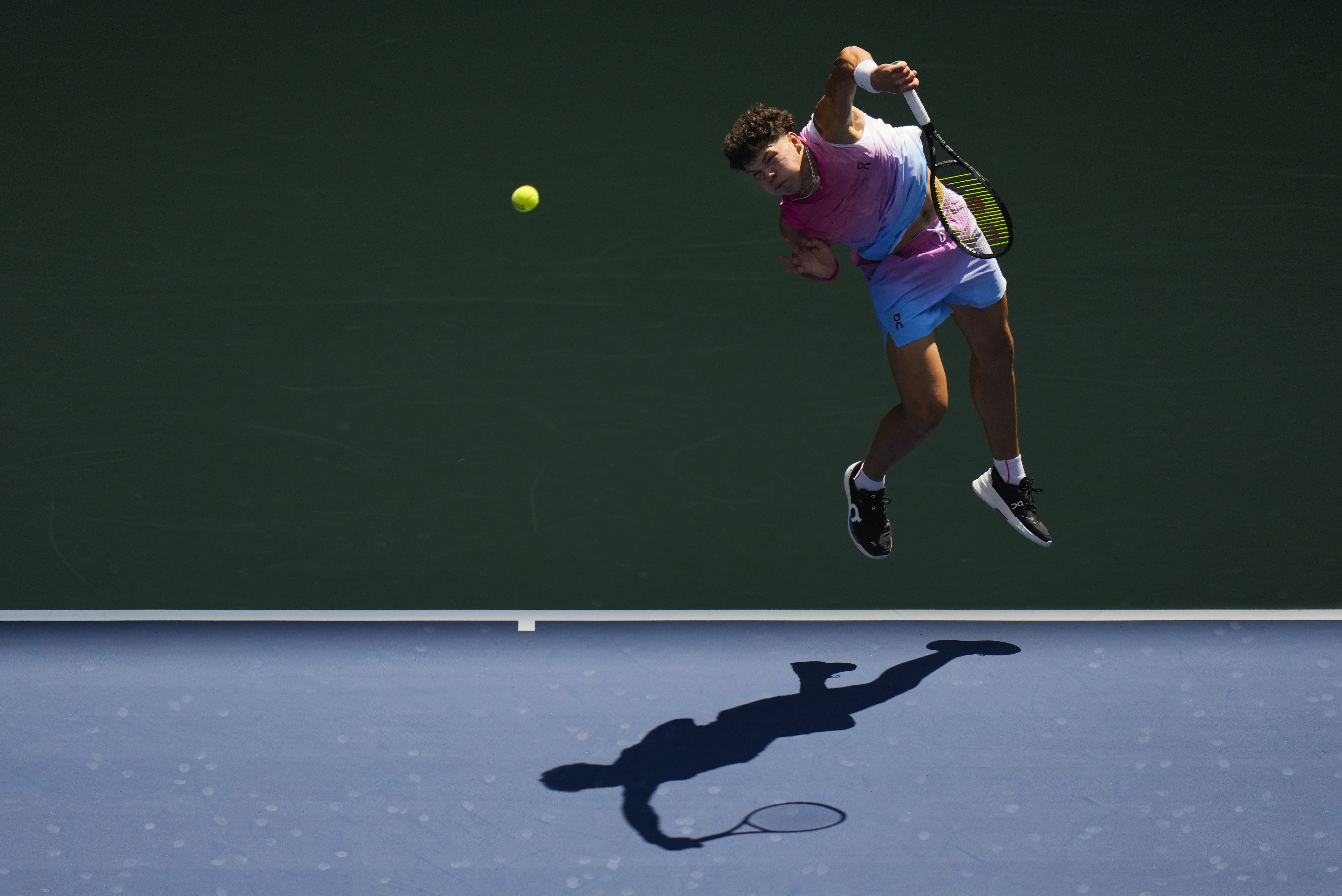 Ben Shelton — an American ranked 13th in the world — returns a shot during the first round of the U.S. Open, which started yesterday in New York.