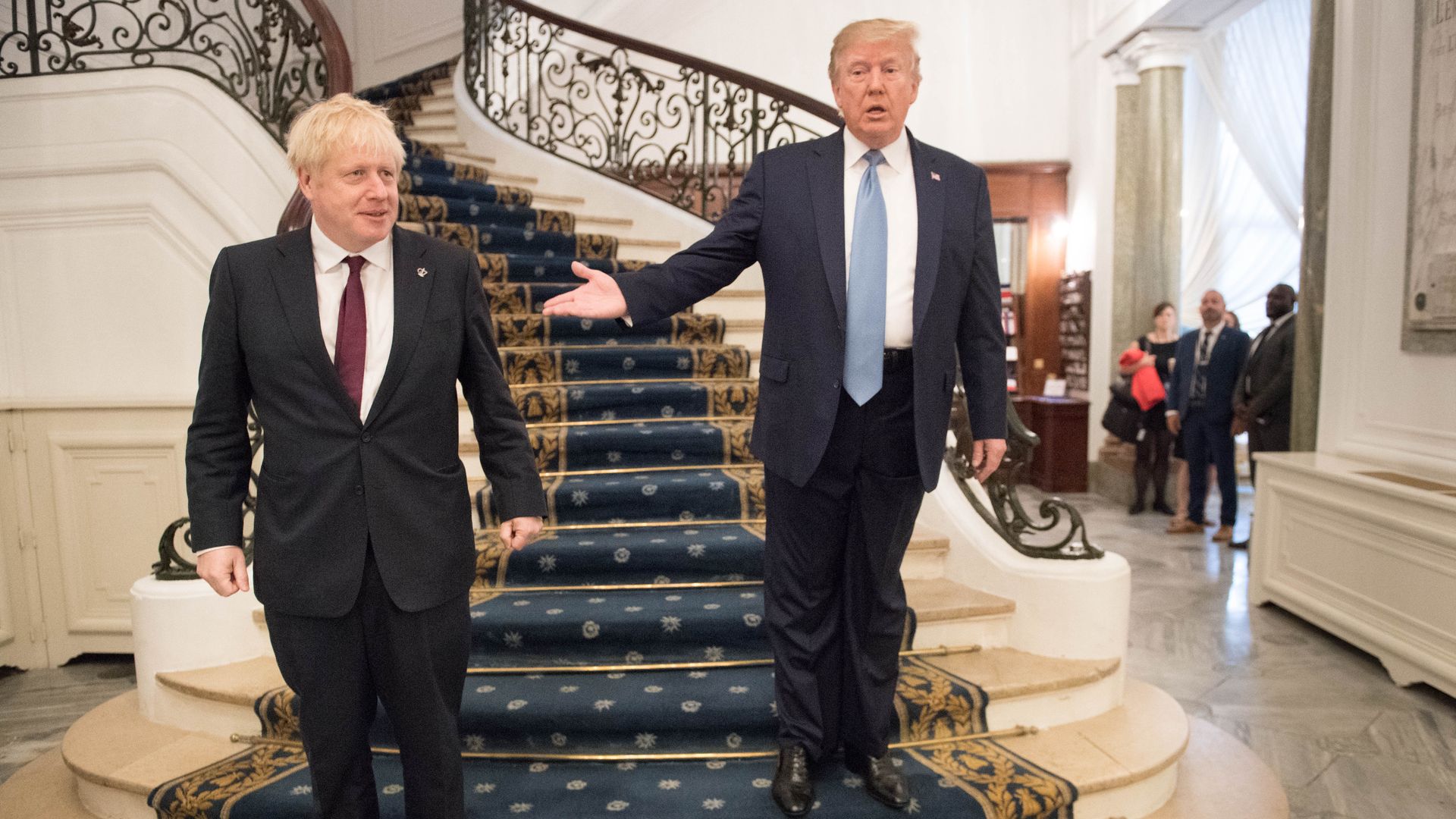 President Donald Trump and Britain's Prime Minister Boris Johnson arrive for a bilateral meeting during the G7 summit on August 25, 2019 in Biarritz, France