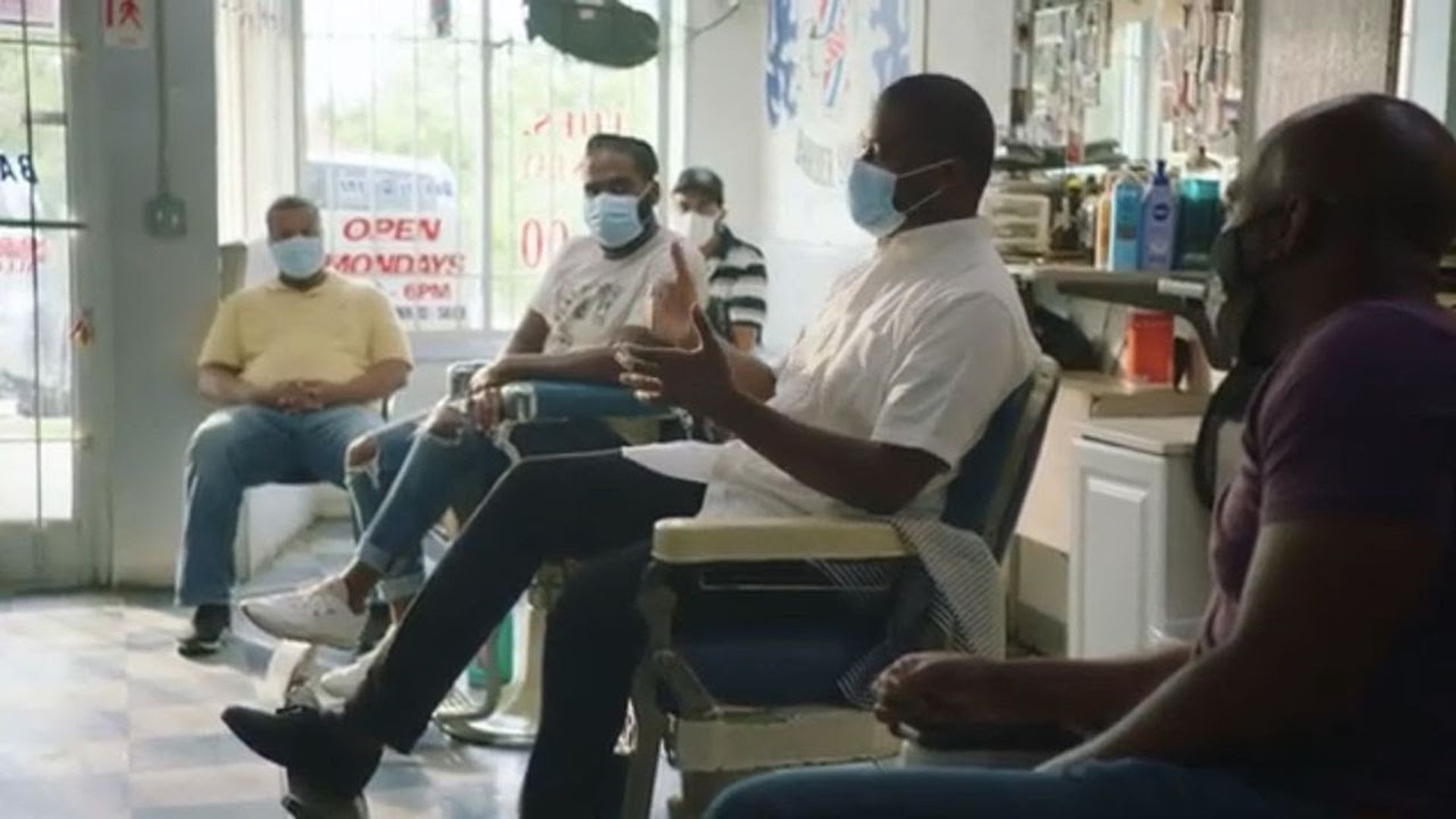 A scene from a Biden ad series aimed at Black Americans, "Shop Talk," announced today. Image: Biden for President