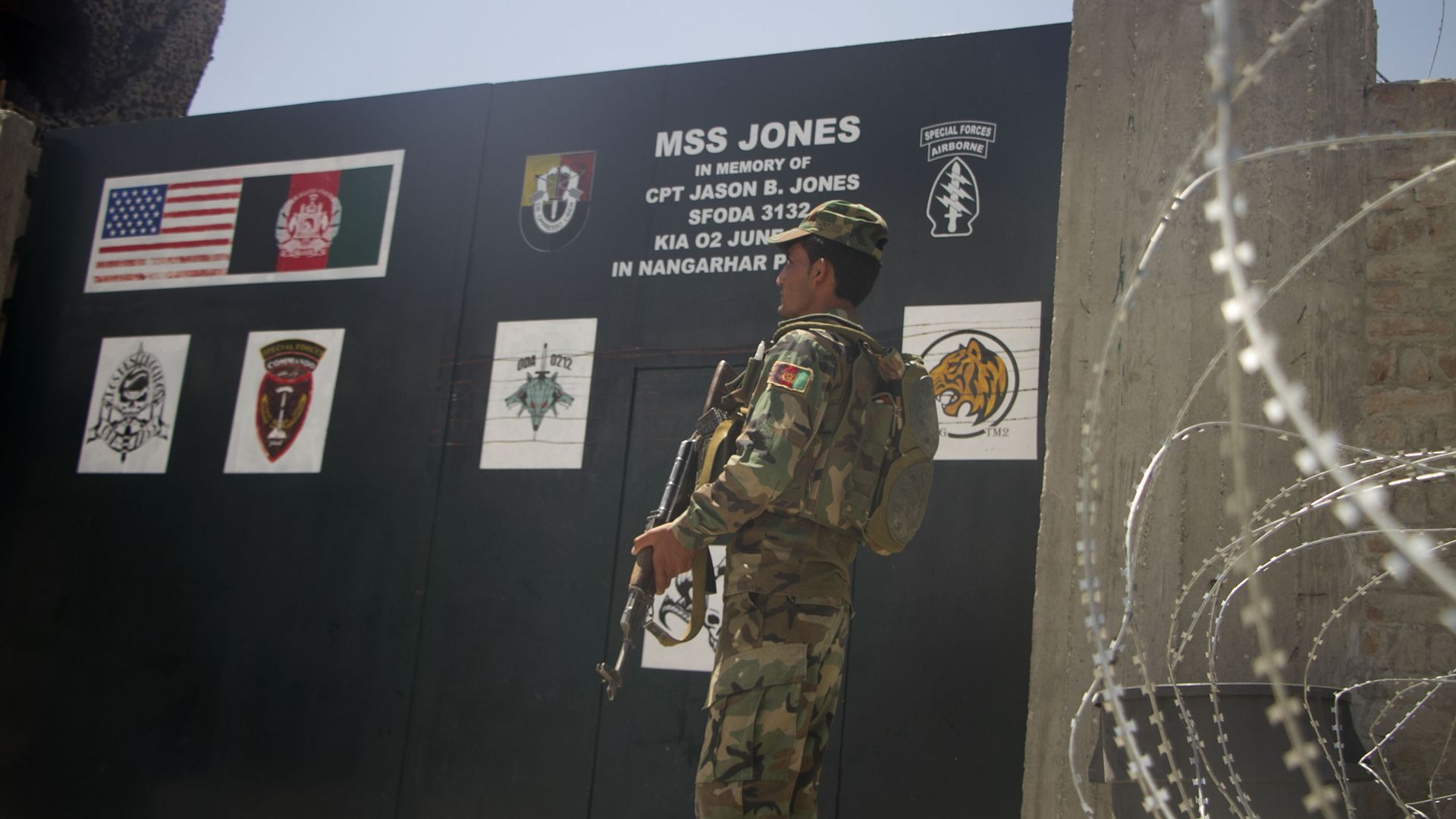 An Afghan border forces soldier stands guard at a U.S. forces base which has been handed over to Afghan border forces in Dih Bala district of Nangarhar province, eastern Afghanistan, July 20