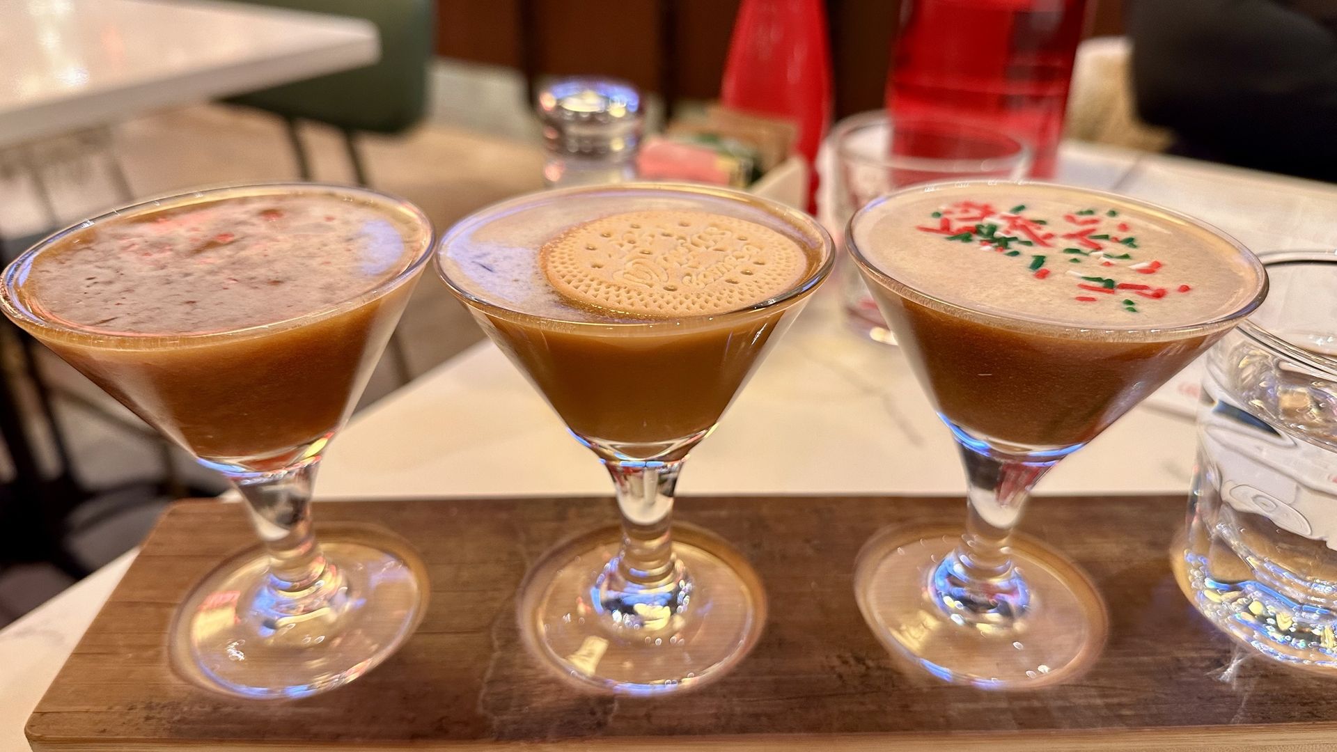 Three brown cocktails as a flight