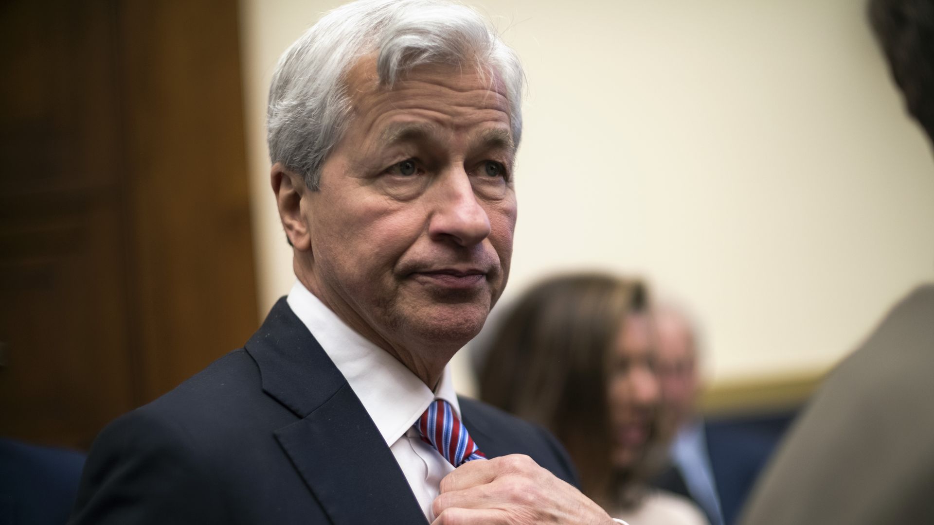 Jamie Dimon, Chair and CEO of JP Morgan Chase, takes his seat to testify before the House Financial Services Commitee in Washington Wednesday April 10