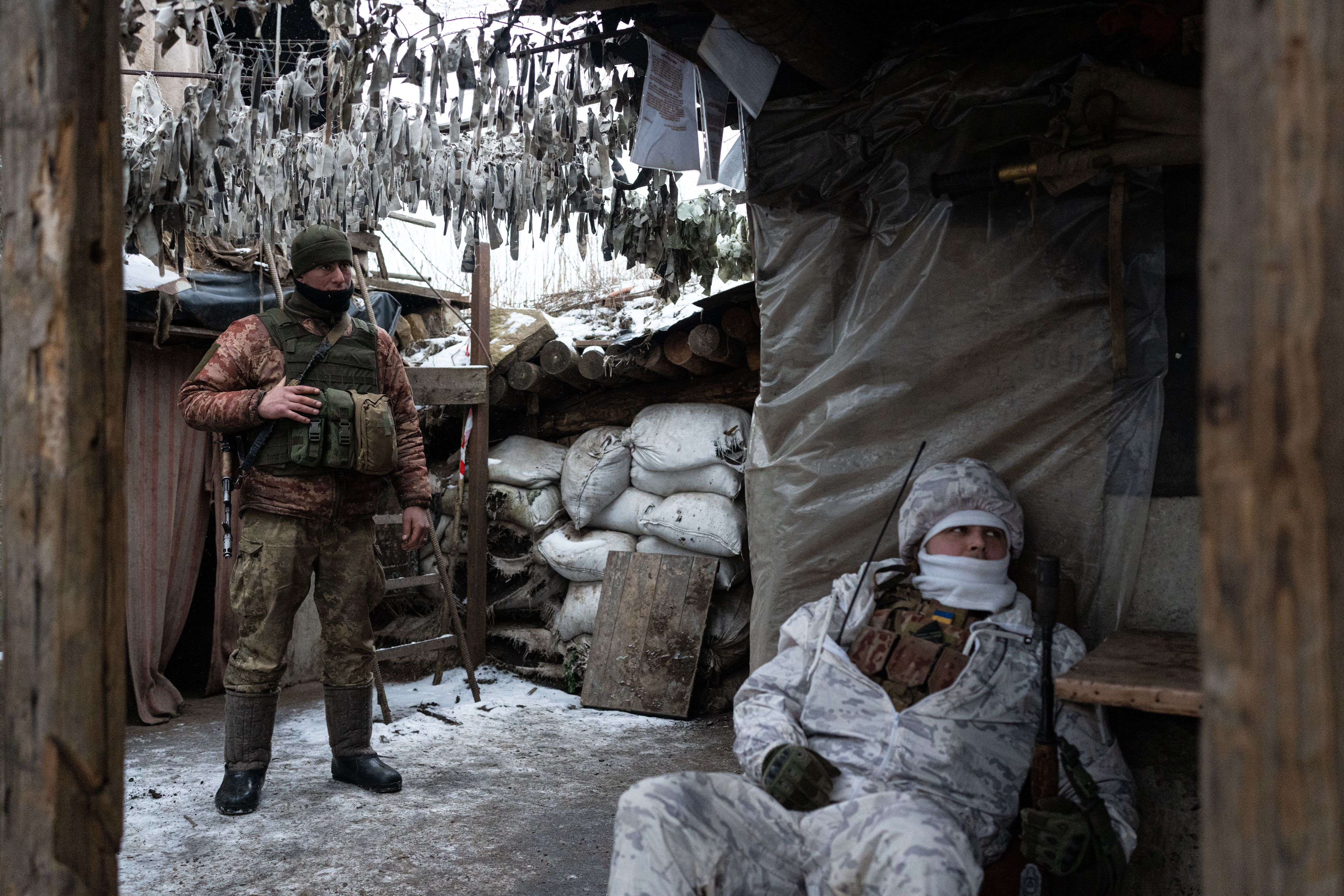 Ukrainian Servicemen of the 30th Army Brigade are seen outside of Svitlodarsk, Ukraine on January 23.
