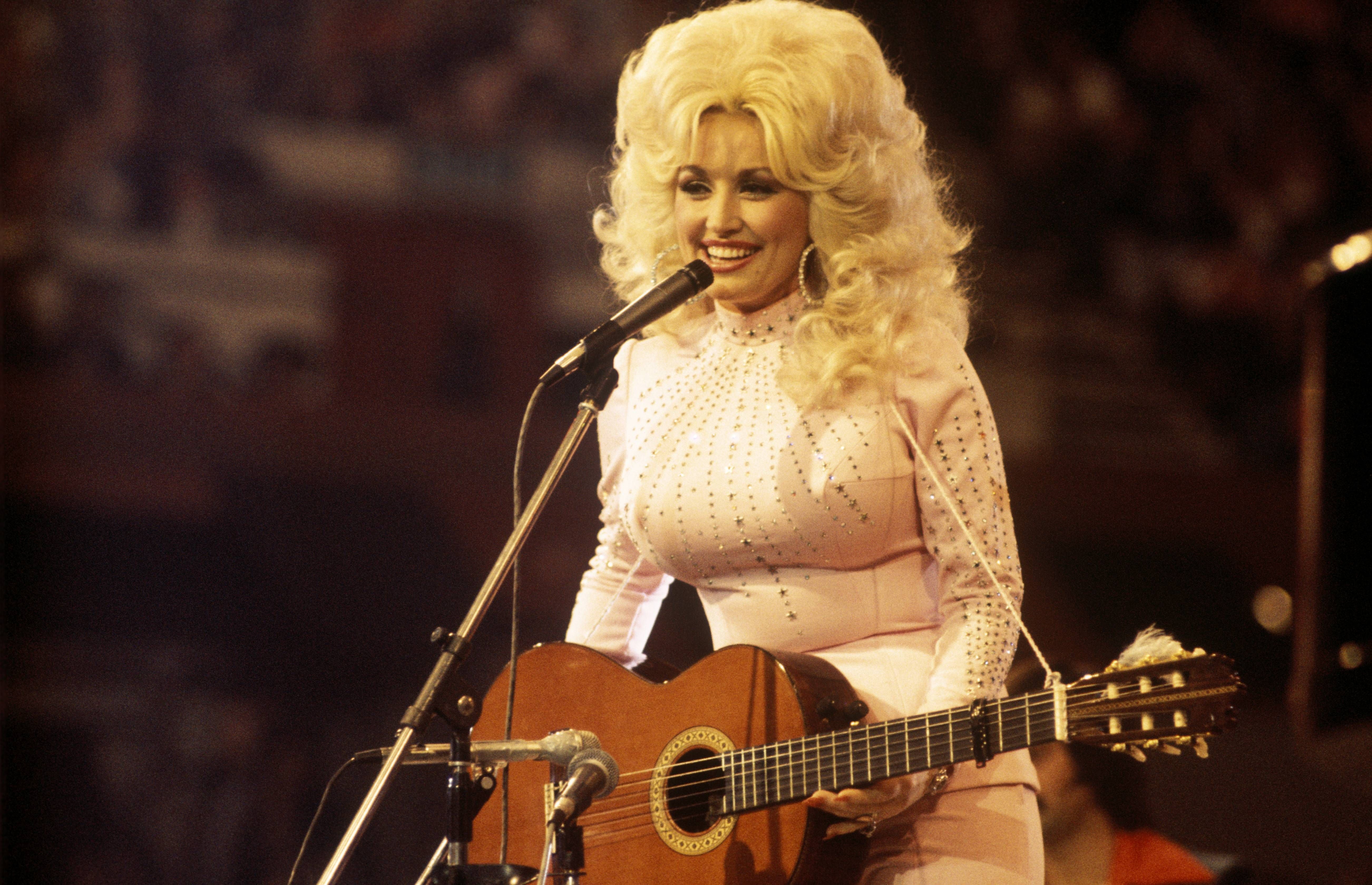 Dolly Parton performing in 1976.