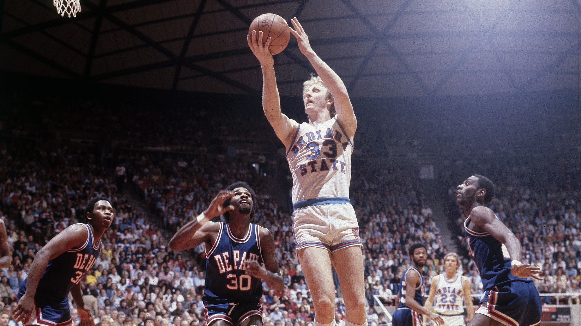 Basketball player jumping high
