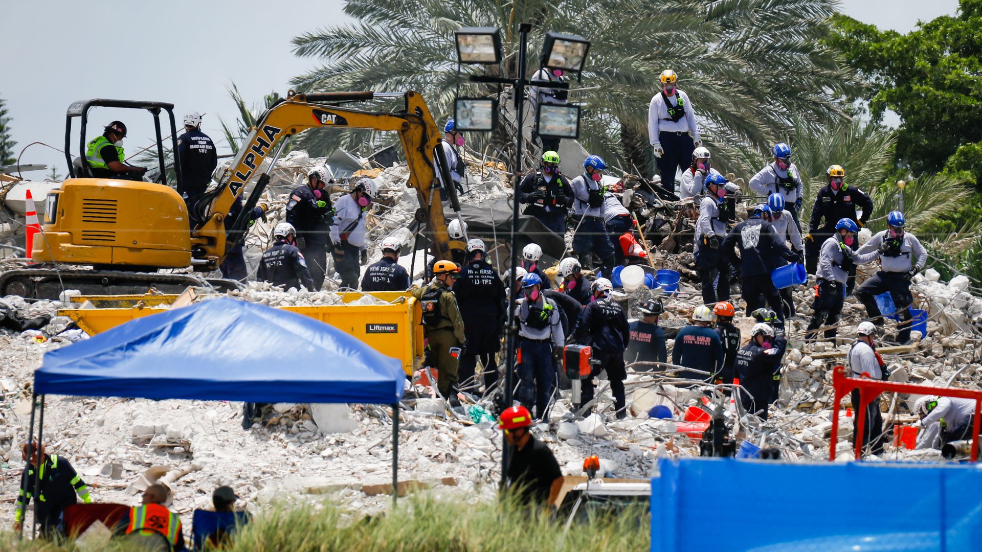  Team of rescue workers are seen during a rescue operation of the Champlain Tower in Surfside, Florida, U.S., on July 05