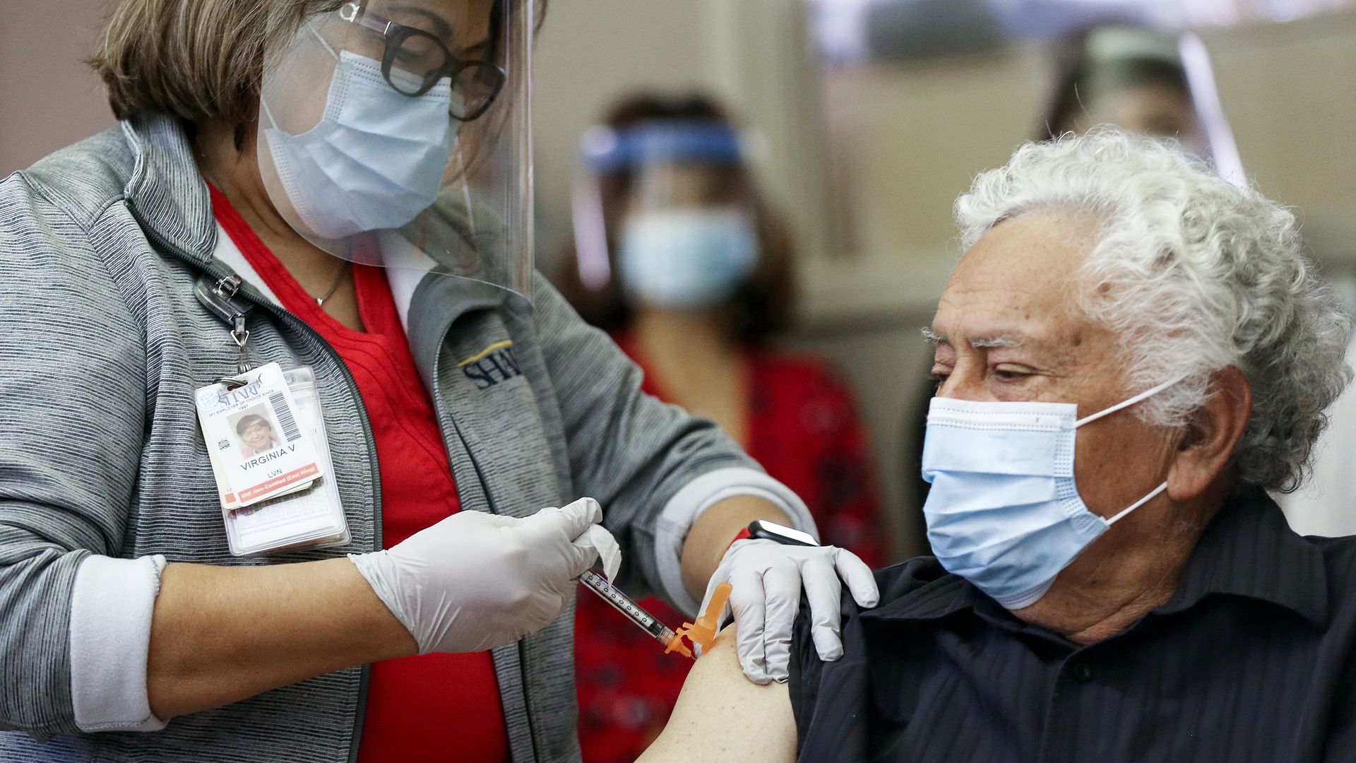 Picture of a patient receiving the Pfizer-BioNTech coronavirus vaccine